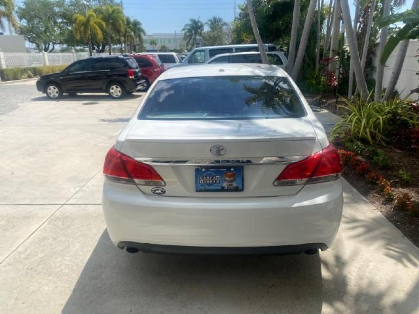 2011 Blizzard Pearl /Ivory Toyota Avalon Sunroof Limited low miles 69,373 1 FL (4T1BK3DB8BU) with an 3.5L DOHC EFI 24-Valve V6 Engine engine, Automatic transmission, located at 4701 North Dixie Hwy, Pompano Beach, FL, 33064, (954) 422-2889, 26.240938, -80.123474 - OUR WEBPAGE FLORIDACARS1.COM HAS OVER 100 PHOTOS AND FREE CARFAX LINK 2011 TOYOTA AVALON LIMITED $ 36,435 NEW VIN: 4T1BK3DB8BU428356 4 T 1 B K 3 D B 8 B U 4 2 8 3 5 6 SEDAN 4 DR 3.5L V6 F DOHC 24V 29 mpg GASOLINE FRONT WHEEL DRIVE Top Features A/C Seat(s) Navigation System Alloy Wheels Power Hatch/D - Photo#80