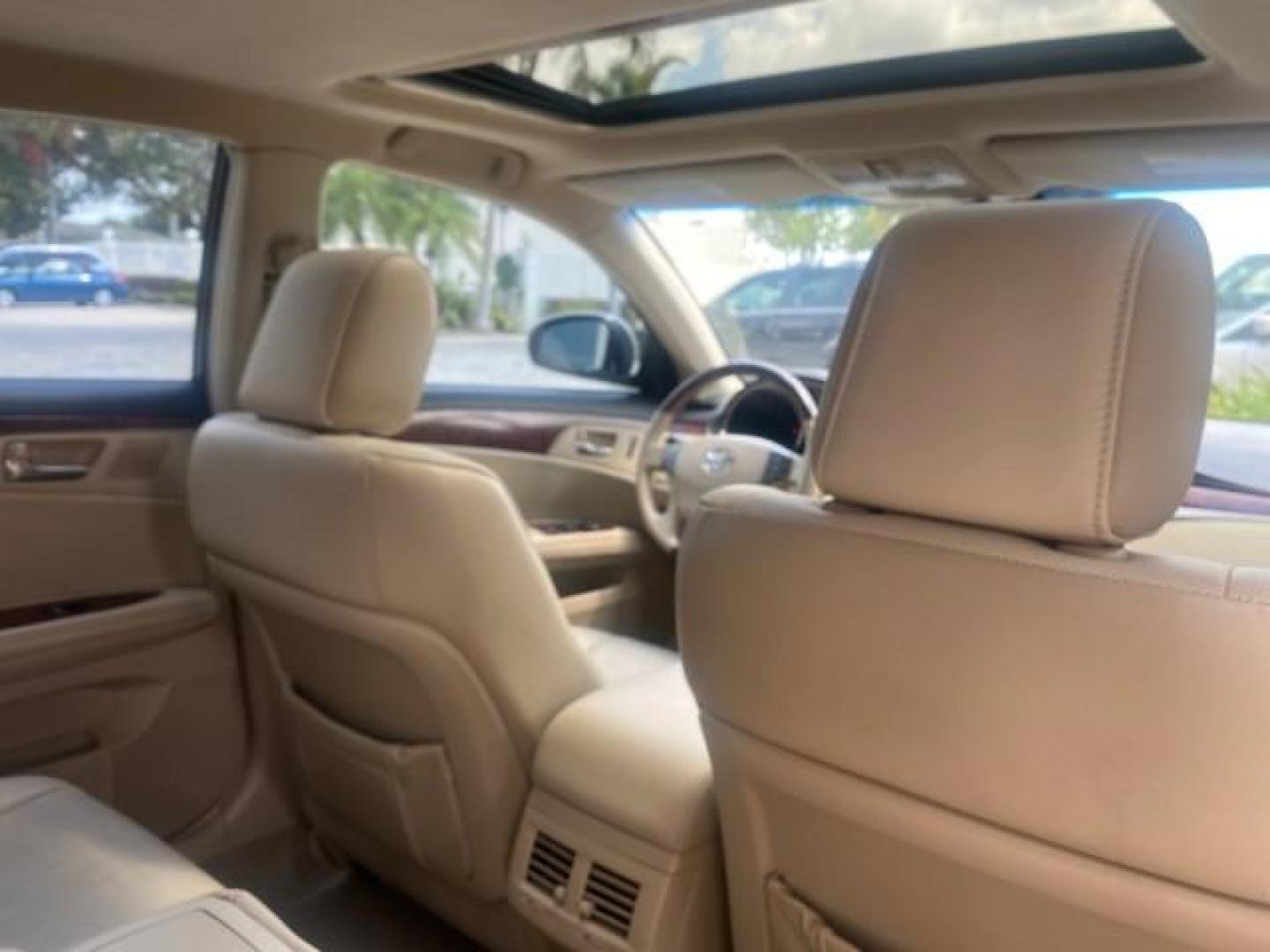 2011 Blizzard Pearl /Ivory Toyota Avalon Sunroof Limited low miles 69,373 1 FL (4T1BK3DB8BU) with an 3.5L DOHC EFI 24-Valve V6 Engine engine, Automatic transmission, located at 4701 North Dixie Hwy, Pompano Beach, FL, 33064, (954) 422-2889, 26.240938, -80.123474 - OUR WEBPAGE FLORIDACARS1.COM HAS OVER 100 PHOTOS AND FREE CARFAX LINK 2011 TOYOTA AVALON LIMITED $ 36,435 NEW VIN: 4T1BK3DB8BU428356 4 T 1 B K 3 D B 8 B U 4 2 8 3 5 6 SEDAN 4 DR 3.5L V6 F DOHC 24V 29 mpg GASOLINE FRONT WHEEL DRIVE Top Features A/C Seat(s) Navigation System Alloy Wheels Power Hatch/D - Photo#95