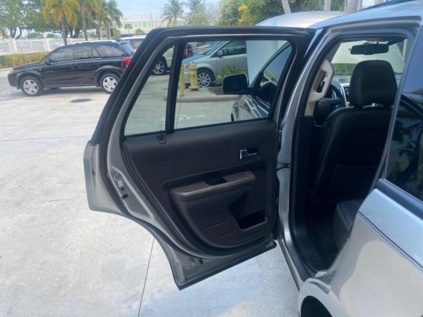 2008 Vapor Silver Metallic /Charcoal Black Ford Edge 1 FL SEL LOW MILES 54,778 (2FMDK38CX8B) with an 3.5L V6 Duratec Engine engine, Automatic transmission, located at 4701 North Dixie Hwy, Pompano Beach, FL, 33064, (954) 422-2889, 26.240938, -80.123474 - OUR WEBPAGE FLORIDACARS1.COM HAS OVER 100 PHOTOS AND FREE CARFAX LINK 2008 FORD EDGE SEL BEAUTIFUL CONDITION! VIN: 2FMDK38CX8BA38384 2 F M D K 3 8 C X 8 B A 3 8 3 8 4 4 DOOR WAGON/SPORT UTILITY 3.5L V6 F GASOLINE FRONT WHEEL DRIVE Top Features Alloy Wheels Premium Package Bluetooth Technology Satell - Photo#13
