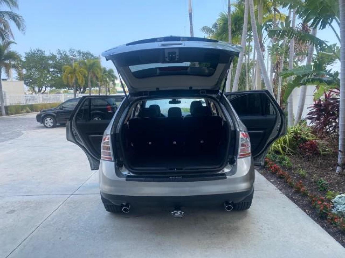 2008 Vapor Silver Metallic /Charcoal Black Ford Edge 1 FL SEL LOW MILES 54,778 (2FMDK38CX8B) with an 3.5L V6 Duratec Engine engine, Automatic transmission, located at 4701 North Dixie Hwy, Pompano Beach, FL, 33064, (954) 422-2889, 26.240938, -80.123474 - OUR WEBPAGE FLORIDACARS1.COM HAS OVER 100 PHOTOS AND FREE CARFAX LINK 2008 FORD EDGE SEL BEAUTIFUL CONDITION! VIN: 2FMDK38CX8BA38384 2 F M D K 3 8 C X 8 B A 3 8 3 8 4 4 DOOR WAGON/SPORT UTILITY 3.5L V6 F GASOLINE FRONT WHEEL DRIVE Top Features Alloy Wheels Premium Package Bluetooth Technology Satell - Photo#15