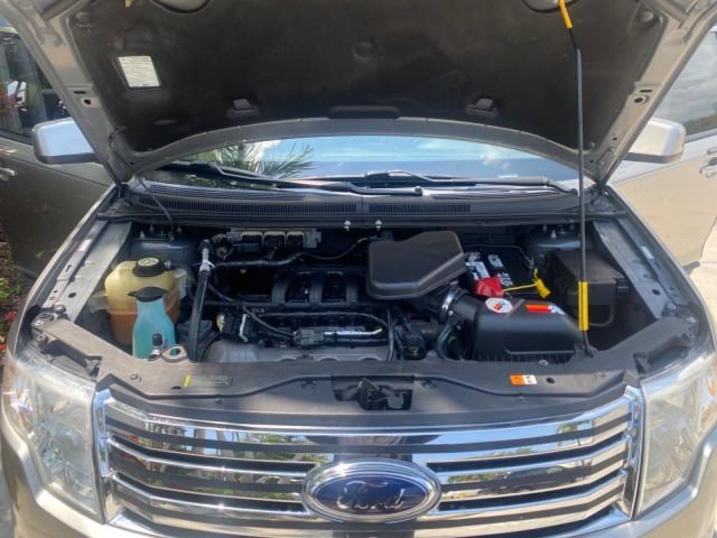 2008 Vapor Silver Metallic /Charcoal Black Ford Edge 1 FL SEL LOW MILES 54,778 (2FMDK38CX8B) with an 3.5L V6 Duratec Engine engine, Automatic transmission, located at 4701 North Dixie Hwy, Pompano Beach, FL, 33064, (954) 422-2889, 26.240938, -80.123474 - OUR WEBPAGE FLORIDACARS1.COM HAS OVER 100 PHOTOS AND FREE CARFAX LINK 2008 FORD EDGE SEL BEAUTIFUL CONDITION! VIN: 2FMDK38CX8BA38384 2 F M D K 3 8 C X 8 B A 3 8 3 8 4 4 DOOR WAGON/SPORT UTILITY 3.5L V6 F GASOLINE FRONT WHEEL DRIVE Top Features Alloy Wheels Premium Package Bluetooth Technology Satell - Photo#17