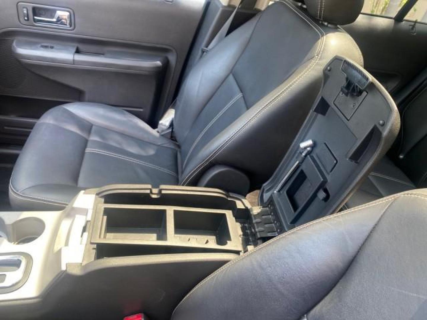 2008 Vapor Silver Metallic /Charcoal Black Ford Edge 1 FL SEL LOW MILES 54,778 (2FMDK38CX8B) with an 3.5L V6 Duratec Engine engine, Automatic transmission, located at 4701 North Dixie Hwy, Pompano Beach, FL, 33064, (954) 422-2889, 26.240938, -80.123474 - OUR WEBPAGE FLORIDACARS1.COM HAS OVER 100 PHOTOS AND FREE CARFAX LINK 2008 FORD EDGE SEL BEAUTIFUL CONDITION! VIN: 2FMDK38CX8BA38384 2 F M D K 3 8 C X 8 B A 3 8 3 8 4 4 DOOR WAGON/SPORT UTILITY 3.5L V6 F GASOLINE FRONT WHEEL DRIVE Top Features Alloy Wheels Premium Package Bluetooth Technology Satell - Photo#53