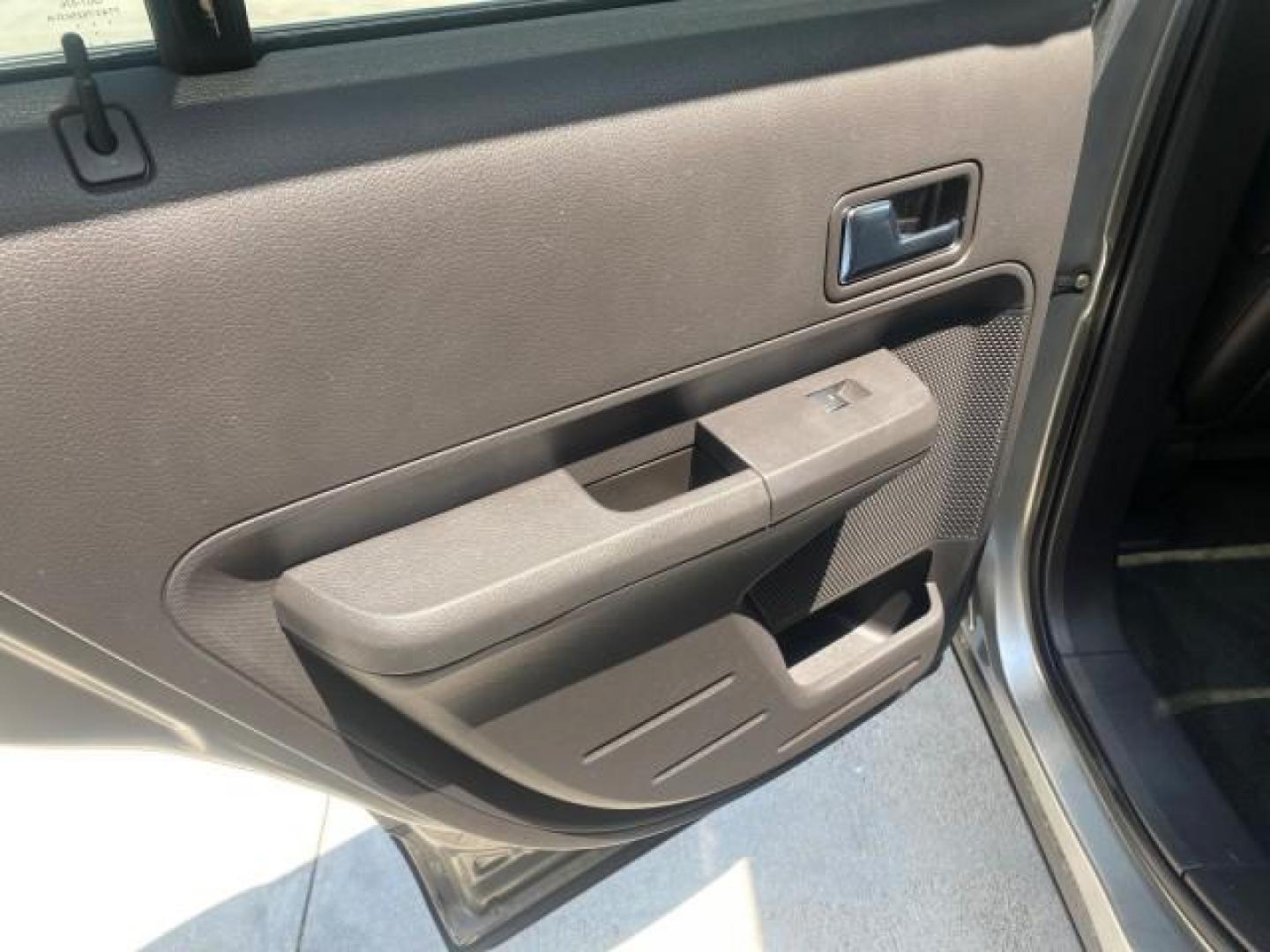2008 Vapor Silver Metallic /Charcoal Black Ford Edge 1 FL SEL LOW MILES 54,778 (2FMDK38CX8B) with an 3.5L V6 Duratec Engine engine, Automatic transmission, located at 4701 North Dixie Hwy, Pompano Beach, FL, 33064, (954) 422-2889, 26.240938, -80.123474 - OUR WEBPAGE FLORIDACARS1.COM HAS OVER 100 PHOTOS AND FREE CARFAX LINK 2008 FORD EDGE SEL BEAUTIFUL CONDITION! VIN: 2FMDK38CX8BA38384 2 F M D K 3 8 C X 8 B A 3 8 3 8 4 4 DOOR WAGON/SPORT UTILITY 3.5L V6 F GASOLINE FRONT WHEEL DRIVE Top Features Alloy Wheels Premium Package Bluetooth Technology Satell - Photo#56