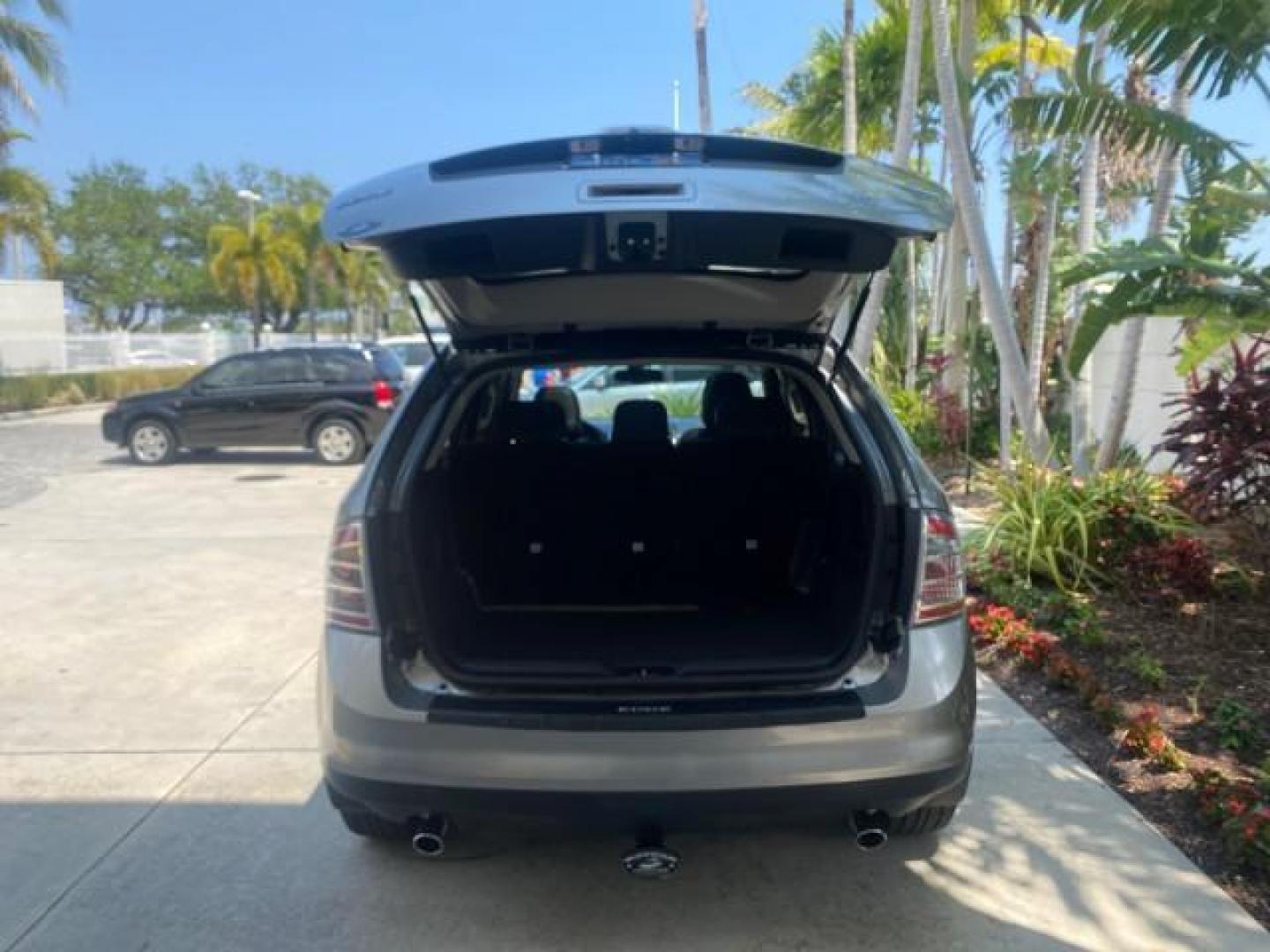 2008 Vapor Silver Metallic /Charcoal Black Ford Edge 1 FL SEL LOW MILES 54,778 (2FMDK38CX8B) with an 3.5L V6 Duratec Engine engine, Automatic transmission, located at 4701 North Dixie Hwy, Pompano Beach, FL, 33064, (954) 422-2889, 26.240938, -80.123474 - OUR WEBPAGE FLORIDACARS1.COM HAS OVER 100 PHOTOS AND FREE CARFAX LINK 2008 FORD EDGE SEL BEAUTIFUL CONDITION! VIN: 2FMDK38CX8BA38384 2 F M D K 3 8 C X 8 B A 3 8 3 8 4 4 DOOR WAGON/SPORT UTILITY 3.5L V6 F GASOLINE FRONT WHEEL DRIVE Top Features Alloy Wheels Premium Package Bluetooth Technology Satell - Photo#72