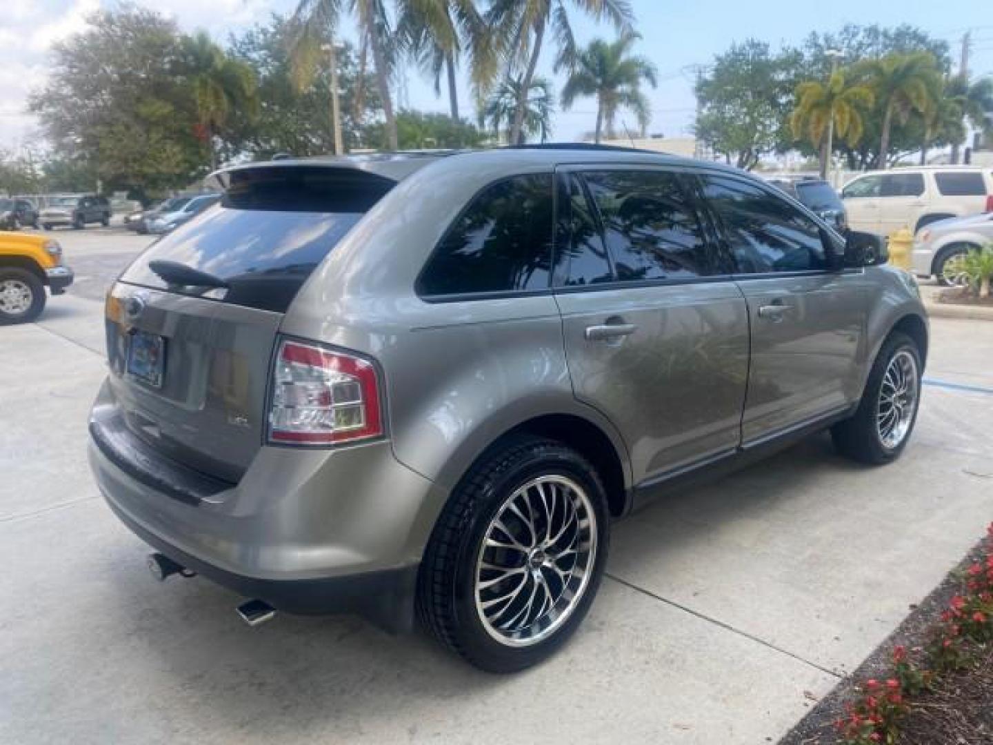 2008 Vapor Silver Metallic /Charcoal Black Ford Edge 1 FL SEL LOW MILES 54,778 (2FMDK38CX8B) with an 3.5L V6 Duratec Engine engine, Automatic transmission, located at 4701 North Dixie Hwy, Pompano Beach, FL, 33064, (954) 422-2889, 26.240938, -80.123474 - OUR WEBPAGE FLORIDACARS1.COM HAS OVER 100 PHOTOS AND FREE CARFAX LINK 2008 FORD EDGE SEL BEAUTIFUL CONDITION! VIN: 2FMDK38CX8BA38384 2 F M D K 3 8 C X 8 B A 3 8 3 8 4 4 DOOR WAGON/SPORT UTILITY 3.5L V6 F GASOLINE FRONT WHEEL DRIVE Top Features Alloy Wheels Premium Package Bluetooth Technology Satell - Photo#7