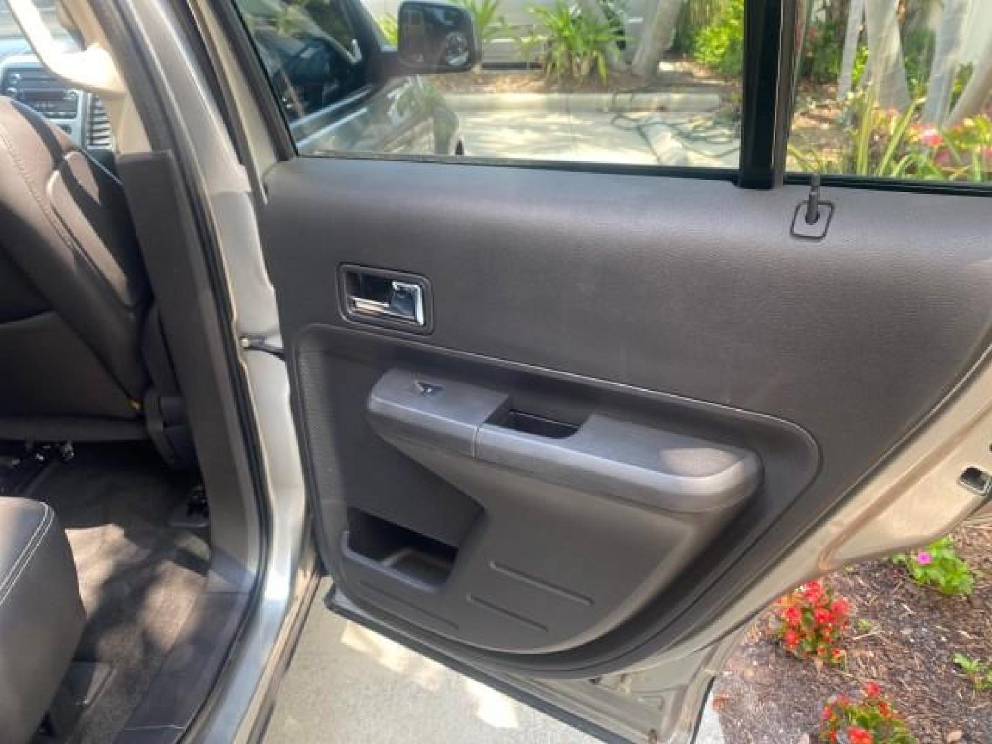 2008 Vapor Silver Metallic /Charcoal Black Ford Edge 1 FL SEL LOW MILES 54,778 (2FMDK38CX8B) with an 3.5L V6 Duratec Engine engine, Automatic transmission, located at 4701 North Dixie Hwy, Pompano Beach, FL, 33064, (954) 422-2889, 26.240938, -80.123474 - OUR WEBPAGE FLORIDACARS1.COM HAS OVER 100 PHOTOS AND FREE CARFAX LINK 2008 FORD EDGE SEL BEAUTIFUL CONDITION! VIN: 2FMDK38CX8BA38384 2 F M D K 3 8 C X 8 B A 3 8 3 8 4 4 DOOR WAGON/SPORT UTILITY 3.5L V6 F GASOLINE FRONT WHEEL DRIVE Top Features Alloy Wheels Premium Package Bluetooth Technology Satell - Photo#82