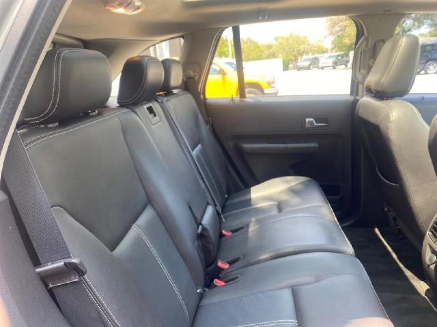 2008 Vapor Silver Metallic /Charcoal Black Ford Edge 1 FL SEL LOW MILES 54,778 (2FMDK38CX8B) with an 3.5L V6 Duratec Engine engine, Automatic transmission, located at 4701 North Dixie Hwy, Pompano Beach, FL, 33064, (954) 422-2889, 26.240938, -80.123474 - OUR WEBPAGE FLORIDACARS1.COM HAS OVER 100 PHOTOS AND FREE CARFAX LINK 2008 FORD EDGE SEL BEAUTIFUL CONDITION! VIN: 2FMDK38CX8BA38384 2 F M D K 3 8 C X 8 B A 3 8 3 8 4 4 DOOR WAGON/SPORT UTILITY 3.5L V6 F GASOLINE FRONT WHEEL DRIVE Top Features Alloy Wheels Premium Package Bluetooth Technology Satell - Photo#84