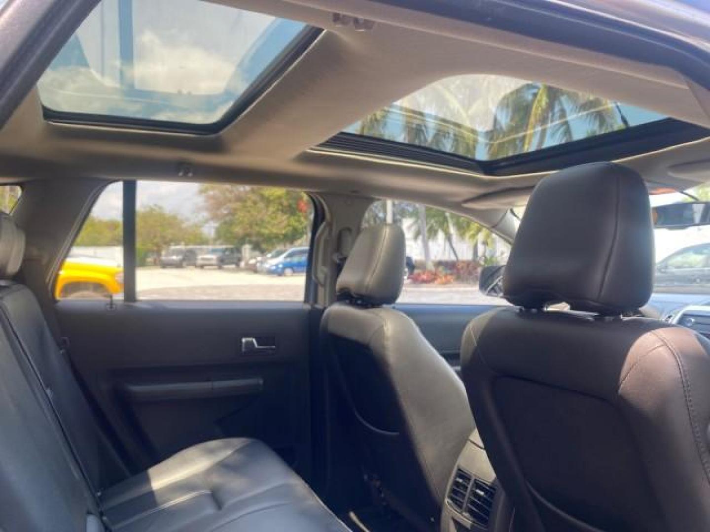 2008 Vapor Silver Metallic /Charcoal Black Ford Edge 1 FL SEL LOW MILES 54,778 (2FMDK38CX8B) with an 3.5L V6 Duratec Engine engine, Automatic transmission, located at 4701 North Dixie Hwy, Pompano Beach, FL, 33064, (954) 422-2889, 26.240938, -80.123474 - OUR WEBPAGE FLORIDACARS1.COM HAS OVER 100 PHOTOS AND FREE CARFAX LINK 2008 FORD EDGE SEL BEAUTIFUL CONDITION! VIN: 2FMDK38CX8BA38384 2 F M D K 3 8 C X 8 B A 3 8 3 8 4 4 DOOR WAGON/SPORT UTILITY 3.5L V6 F GASOLINE FRONT WHEEL DRIVE Top Features Alloy Wheels Premium Package Bluetooth Technology Satell - Photo#85