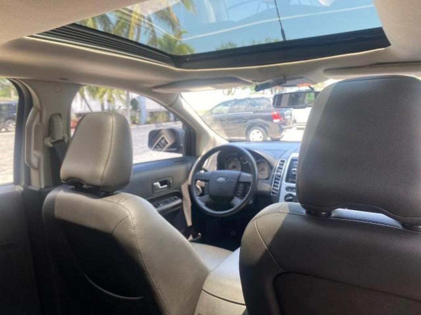 2008 Vapor Silver Metallic /Charcoal Black Ford Edge 1 FL SEL LOW MILES 54,778 (2FMDK38CX8B) with an 3.5L V6 Duratec Engine engine, Automatic transmission, located at 4701 North Dixie Hwy, Pompano Beach, FL, 33064, (954) 422-2889, 26.240938, -80.123474 - OUR WEBPAGE FLORIDACARS1.COM HAS OVER 100 PHOTOS AND FREE CARFAX LINK 2008 FORD EDGE SEL BEAUTIFUL CONDITION! VIN: 2FMDK38CX8BA38384 2 F M D K 3 8 C X 8 B A 3 8 3 8 4 4 DOOR WAGON/SPORT UTILITY 3.5L V6 F GASOLINE FRONT WHEEL DRIVE Top Features Alloy Wheels Premium Package Bluetooth Technology Satell - Photo#87