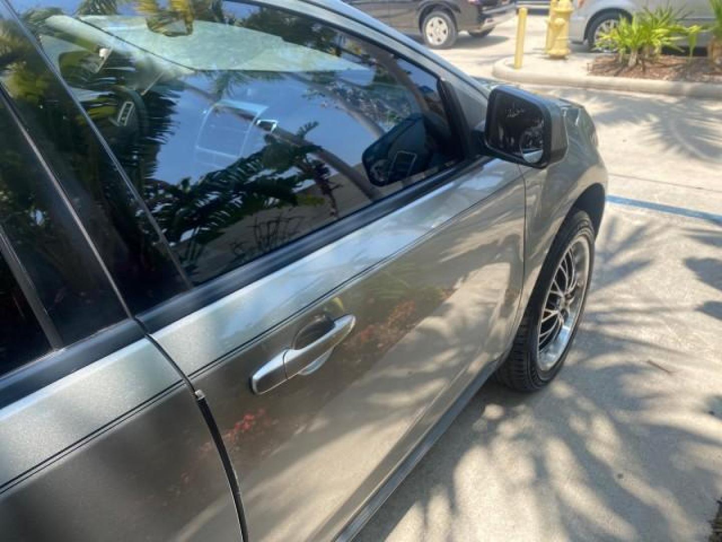 2008 Vapor Silver Metallic /Charcoal Black Ford Edge 1 FL SEL LOW MILES 54,778 (2FMDK38CX8B) with an 3.5L V6 Duratec Engine engine, Automatic transmission, located at 4701 North Dixie Hwy, Pompano Beach, FL, 33064, (954) 422-2889, 26.240938, -80.123474 - OUR WEBPAGE FLORIDACARS1.COM HAS OVER 100 PHOTOS AND FREE CARFAX LINK 2008 FORD EDGE SEL BEAUTIFUL CONDITION! VIN: 2FMDK38CX8BA38384 2 F M D K 3 8 C X 8 B A 3 8 3 8 4 4 DOOR WAGON/SPORT UTILITY 3.5L V6 F GASOLINE FRONT WHEEL DRIVE Top Features Alloy Wheels Premium Package Bluetooth Technology Satell - Photo#89