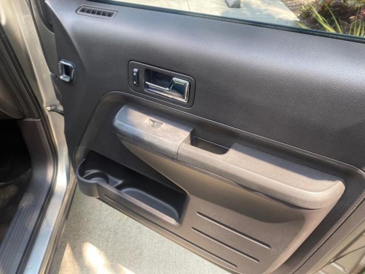 2008 Vapor Silver Metallic /Charcoal Black Ford Edge 1 FL SEL LOW MILES 54,778 (2FMDK38CX8B) with an 3.5L V6 Duratec Engine engine, Automatic transmission, located at 4701 North Dixie Hwy, Pompano Beach, FL, 33064, (954) 422-2889, 26.240938, -80.123474 - OUR WEBPAGE FLORIDACARS1.COM HAS OVER 100 PHOTOS AND FREE CARFAX LINK 2008 FORD EDGE SEL BEAUTIFUL CONDITION! VIN: 2FMDK38CX8BA38384 2 F M D K 3 8 C X 8 B A 3 8 3 8 4 4 DOOR WAGON/SPORT UTILITY 3.5L V6 F GASOLINE FRONT WHEEL DRIVE Top Features Alloy Wheels Premium Package Bluetooth Technology Satell - Photo#91