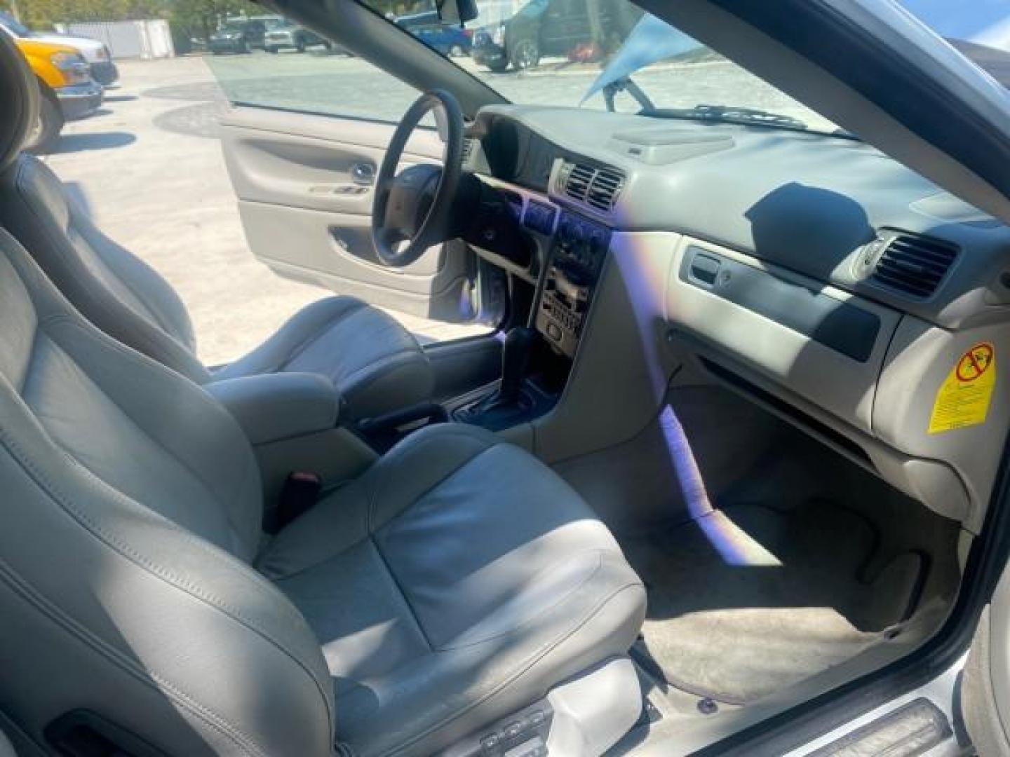 2004 Silver Metallic /Silver Volvo C70 LOW MILES 38,659 LT TURBO (YV1NC63D94J) with an 2.4L DOHC All-Alloy Turbocharged I5 Engine engine, Automatic transmission, located at 4701 North Dixie Hwy, Pompano Beach, FL, 33064, (954) 422-2889, 26.240938, -80.123474 - OUR WEBPAGE FLORIDACARS1.COM HAS OVER 100 PHOTOS AND FREE CARFAX LINK 2004 VOLVO C70 LPT VIN: YV1NC63D94J047469 Y V 1 N C 6 3 D 9 4 J 0 4 7 4 6 9 CONVERTIBLE 2.4L I5 F LT TURBO 27 MPG GASOLINE FRONT WHEEL DRIVE Top Features Front Seat Heaters Leather Seats Memory Seat(s) Turbo Charged Engine Basic F - Photo#12