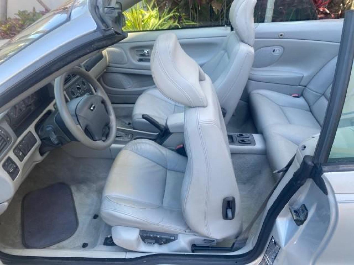 2004 Silver Metallic /Silver Volvo C70 LOW MILES 38,659 LT TURBO (YV1NC63D94J) with an 2.4L DOHC All-Alloy Turbocharged I5 Engine engine, Automatic transmission, located at 4701 North Dixie Hwy, Pompano Beach, FL, 33064, (954) 422-2889, 26.240938, -80.123474 - OUR WEBPAGE FLORIDACARS1.COM HAS OVER 100 PHOTOS AND FREE CARFAX LINK 2004 VOLVO C70 LPT VIN: YV1NC63D94J047469 Y V 1 N C 6 3 D 9 4 J 0 4 7 4 6 9 CONVERTIBLE 2.4L I5 F LT TURBO 27 MPG GASOLINE FRONT WHEEL DRIVE Top Features Front Seat Heaters Leather Seats Memory Seat(s) Turbo Charged Engine Basic F - Photo#53