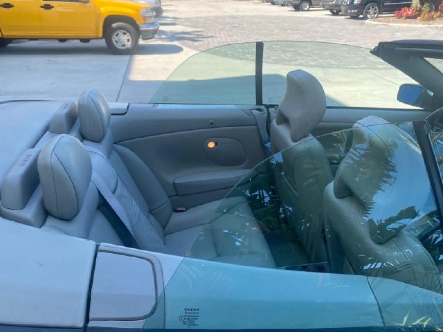 2004 Silver Metallic /Silver Volvo C70 LOW MILES 38,659 LT TURBO (YV1NC63D94J) with an 2.4L DOHC All-Alloy Turbocharged I5 Engine engine, Automatic transmission, located at 4701 North Dixie Hwy, Pompano Beach, FL, 33064, (954) 422-2889, 26.240938, -80.123474 - OUR WEBPAGE FLORIDACARS1.COM HAS OVER 100 PHOTOS AND FREE CARFAX LINK 2004 VOLVO C70 LPT VIN: YV1NC63D94J047469 Y V 1 N C 6 3 D 9 4 J 0 4 7 4 6 9 CONVERTIBLE 2.4L I5 F LT TURBO 27 MPG GASOLINE FRONT WHEEL DRIVE Top Features Front Seat Heaters Leather Seats Memory Seat(s) Turbo Charged Engine Basic F - Photo#79