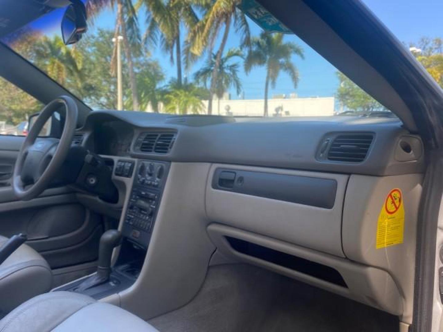 2004 Silver Metallic /Silver Volvo C70 LOW MILES 38,659 LT TURBO (YV1NC63D94J) with an 2.4L DOHC All-Alloy Turbocharged I5 Engine engine, Automatic transmission, located at 4701 North Dixie Hwy, Pompano Beach, FL, 33064, (954) 422-2889, 26.240938, -80.123474 - OUR WEBPAGE FLORIDACARS1.COM HAS OVER 100 PHOTOS AND FREE CARFAX LINK 2004 VOLVO C70 LPT VIN: YV1NC63D94J047469 Y V 1 N C 6 3 D 9 4 J 0 4 7 4 6 9 CONVERTIBLE 2.4L I5 F LT TURBO 27 MPG GASOLINE FRONT WHEEL DRIVE Top Features Front Seat Heaters Leather Seats Memory Seat(s) Turbo Charged Engine Basic F - Photo#87