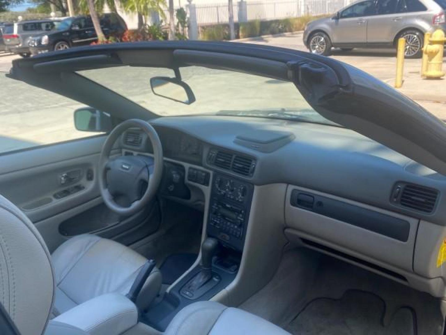 2004 Silver Metallic /Silver Volvo C70 LOW MILES 38,659 LT TURBO (YV1NC63D94J) with an 2.4L DOHC All-Alloy Turbocharged I5 Engine engine, Automatic transmission, located at 4701 North Dixie Hwy, Pompano Beach, FL, 33064, (954) 422-2889, 26.240938, -80.123474 - OUR WEBPAGE FLORIDACARS1.COM HAS OVER 100 PHOTOS AND FREE CARFAX LINK 2004 VOLVO C70 LPT VIN: YV1NC63D94J047469 Y V 1 N C 6 3 D 9 4 J 0 4 7 4 6 9 CONVERTIBLE 2.4L I5 F LT TURBO 27 MPG GASOLINE FRONT WHEEL DRIVE Top Features Front Seat Heaters Leather Seats Memory Seat(s) Turbo Charged Engine Basic F - Photo#90