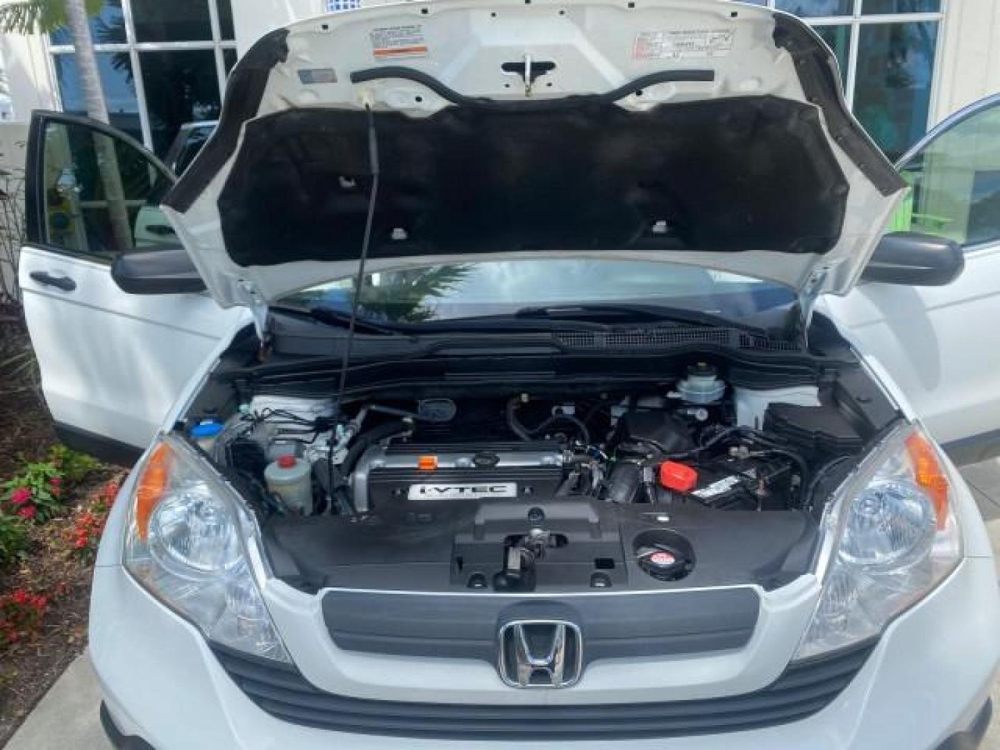 2007 Taffeta White /Gray Honda CR-V LX FL LOW MILES 49,810 (JHLRE38347C) with an 2.4L 4-Cyl Engine engine, Automatic transmission, located at 4701 North Dixie Hwy, Pompano Beach, FL, 33064, (954) 422-2889, 26.240938, -80.123474 - OUR WEBPAGE FLORIDACARS1.COM HAS OVER 100 PHOTOS AND FREE CARFAX LINK 2007 HONDA CR-V LX VIN: JHLRE38347C018084 J H L R E 3 8 3 4 7 C 0 1 8 0 8 4 4 DOOR WAGON/SPORT UTILITY 2.4L I4 F DOHC 16V 30 MPG GASOLINE FRONT WHEEL DRIVE Top Features Cloth Seats Basic Features ABS Brakes Auxiliary Audio Input P - Photo#17
