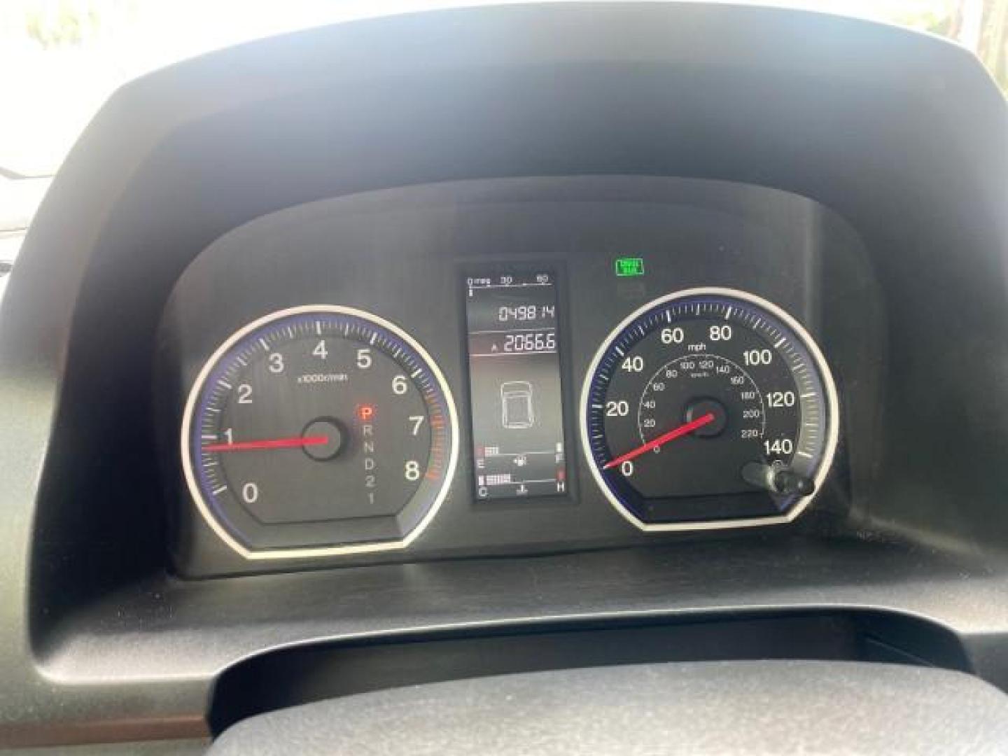 2007 Taffeta White /Gray Honda CR-V LX FL LOW MILES 49,810 (JHLRE38347C) with an 2.4L 4-Cyl Engine engine, Automatic transmission, located at 4701 North Dixie Hwy, Pompano Beach, FL, 33064, (954) 422-2889, 26.240938, -80.123474 - OUR WEBPAGE FLORIDACARS1.COM HAS OVER 100 PHOTOS AND FREE CARFAX LINK 2007 HONDA CR-V LX VIN: JHLRE38347C018084 J H L R E 3 8 3 4 7 C 0 1 8 0 8 4 4 DOOR WAGON/SPORT UTILITY 2.4L I4 F DOHC 16V 30 MPG GASOLINE FRONT WHEEL DRIVE Top Features Cloth Seats Basic Features ABS Brakes Auxiliary Audio Input P - Photo#18
