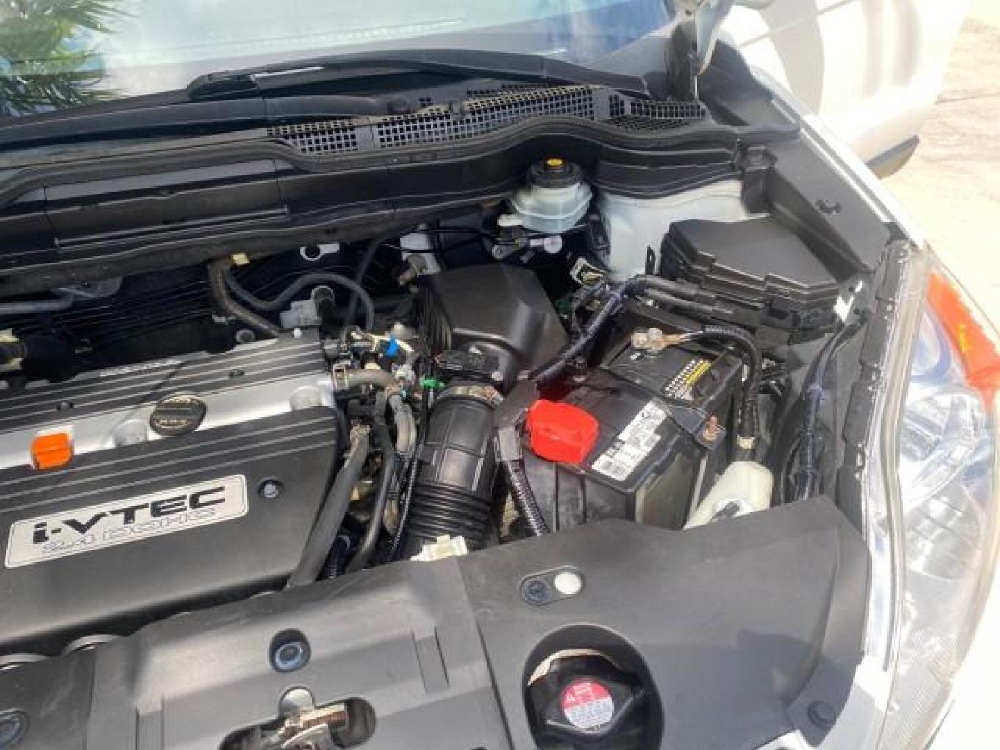2007 Taffeta White /Gray Honda CR-V LX FL LOW MILES 49,810 (JHLRE38347C) with an 2.4L 4-Cyl Engine engine, Automatic transmission, located at 4701 North Dixie Hwy, Pompano Beach, FL, 33064, (954) 422-2889, 26.240938, -80.123474 - OUR WEBPAGE FLORIDACARS1.COM HAS OVER 100 PHOTOS AND FREE CARFAX LINK 2007 HONDA CR-V LX VIN: JHLRE38347C018084 J H L R E 3 8 3 4 7 C 0 1 8 0 8 4 4 DOOR WAGON/SPORT UTILITY 2.4L I4 F DOHC 16V 30 MPG GASOLINE FRONT WHEEL DRIVE Top Features Cloth Seats Basic Features ABS Brakes Auxiliary Audio Input P - Photo#25
