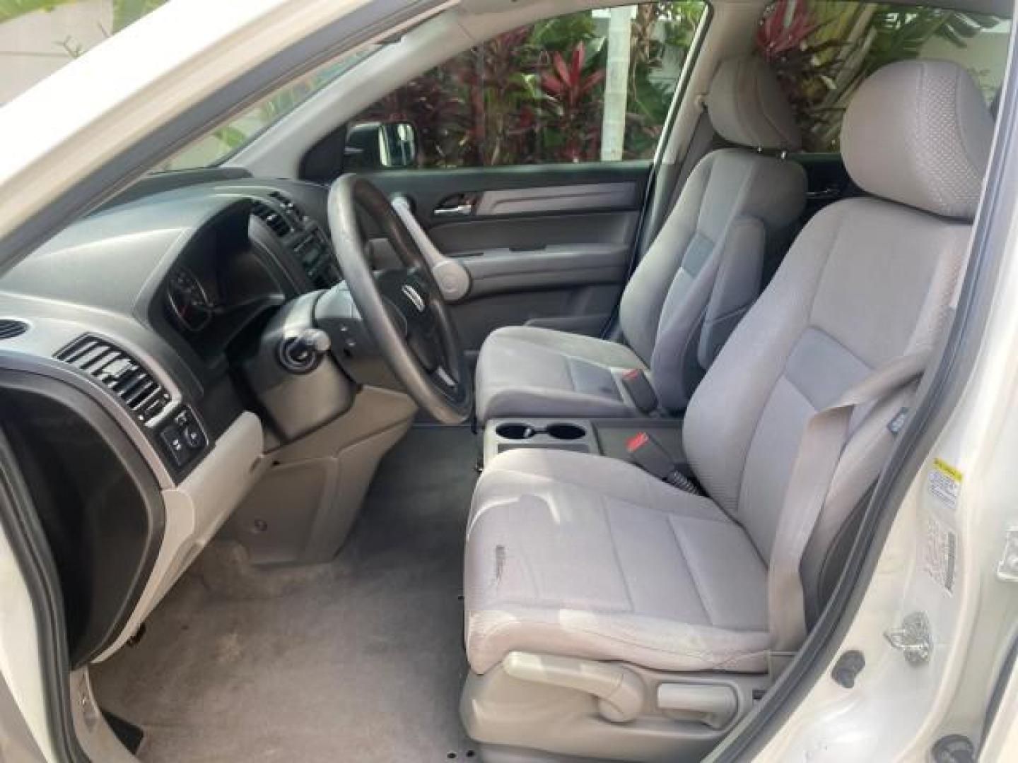 2007 Taffeta White /Gray Honda CR-V LX FL LOW MILES 49,810 (JHLRE38347C) with an 2.4L 4-Cyl Engine engine, Automatic transmission, located at 4701 North Dixie Hwy, Pompano Beach, FL, 33064, (954) 422-2889, 26.240938, -80.123474 - OUR WEBPAGE FLORIDACARS1.COM HAS OVER 100 PHOTOS AND FREE CARFAX LINK 2007 HONDA CR-V LX VIN: JHLRE38347C018084 J H L R E 3 8 3 4 7 C 0 1 8 0 8 4 4 DOOR WAGON/SPORT UTILITY 2.4L I4 F DOHC 16V 30 MPG GASOLINE FRONT WHEEL DRIVE Top Features Cloth Seats Basic Features ABS Brakes Auxiliary Audio Input P - Photo#31