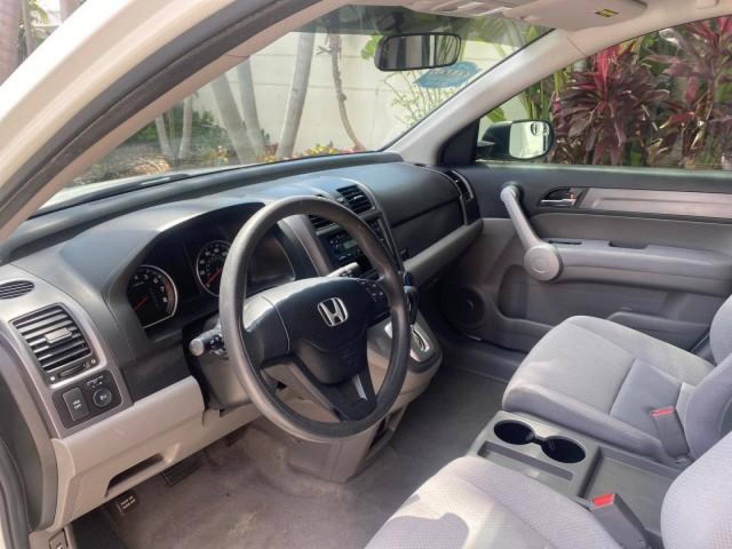 2007 Taffeta White /Gray Honda CR-V LX FL LOW MILES 49,810 (JHLRE38347C) with an 2.4L 4-Cyl Engine engine, Automatic transmission, located at 4701 North Dixie Hwy, Pompano Beach, FL, 33064, (954) 422-2889, 26.240938, -80.123474 - OUR WEBPAGE FLORIDACARS1.COM HAS OVER 100 PHOTOS AND FREE CARFAX LINK 2007 HONDA CR-V LX VIN: JHLRE38347C018084 J H L R E 3 8 3 4 7 C 0 1 8 0 8 4 4 DOOR WAGON/SPORT UTILITY 2.4L I4 F DOHC 16V 30 MPG GASOLINE FRONT WHEEL DRIVE Top Features Cloth Seats Basic Features ABS Brakes Auxiliary Audio Input P - Photo#33