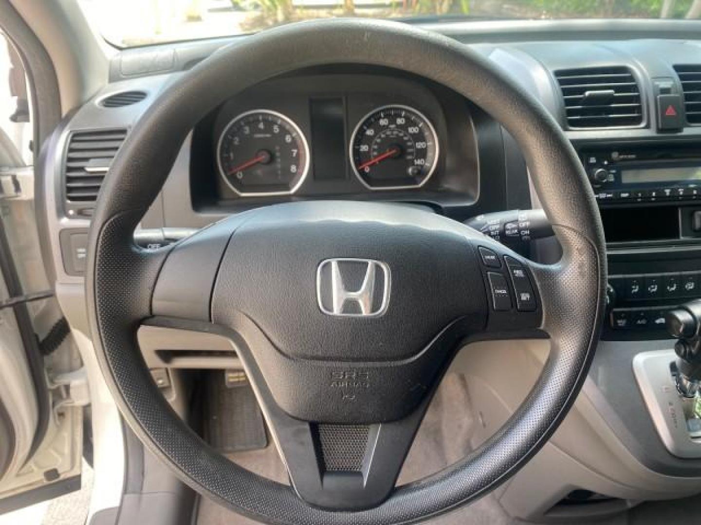 2007 Taffeta White /Gray Honda CR-V LX FL LOW MILES 49,810 (JHLRE38347C) with an 2.4L 4-Cyl Engine engine, Automatic transmission, located at 4701 North Dixie Hwy, Pompano Beach, FL, 33064, (954) 422-2889, 26.240938, -80.123474 - OUR WEBPAGE FLORIDACARS1.COM HAS OVER 100 PHOTOS AND FREE CARFAX LINK 2007 HONDA CR-V LX VIN: JHLRE38347C018084 J H L R E 3 8 3 4 7 C 0 1 8 0 8 4 4 DOOR WAGON/SPORT UTILITY 2.4L I4 F DOHC 16V 30 MPG GASOLINE FRONT WHEEL DRIVE Top Features Cloth Seats Basic Features ABS Brakes Auxiliary Audio Input P - Photo#35