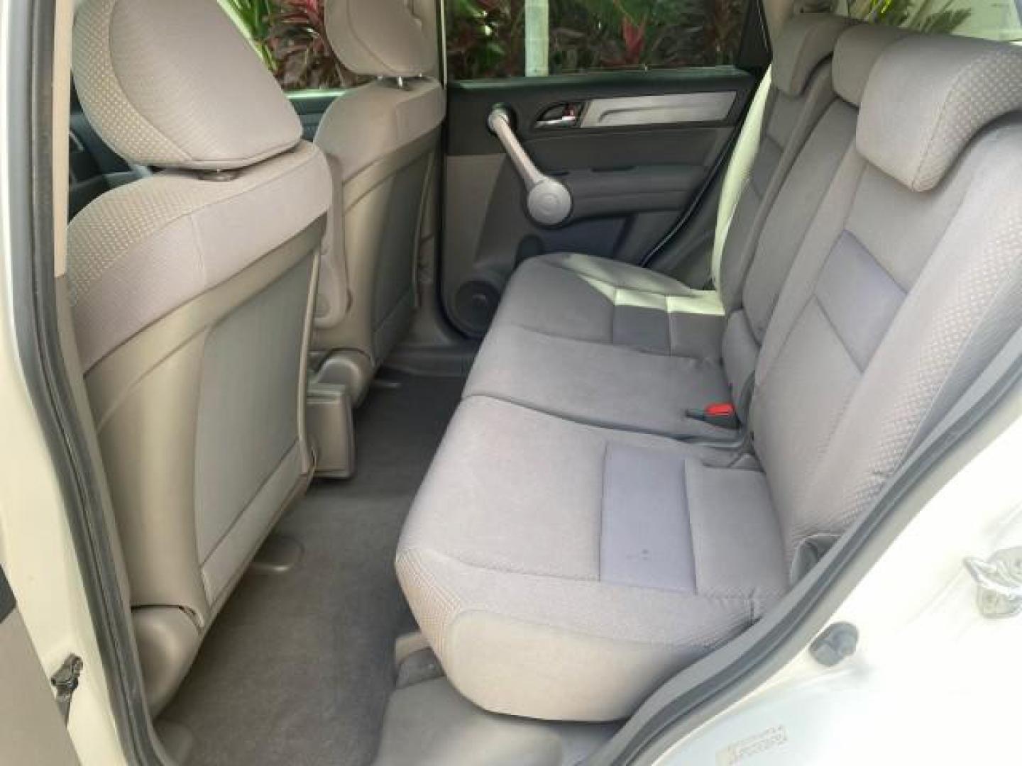 2007 Taffeta White /Gray Honda CR-V LX FL LOW MILES 49,810 (JHLRE38347C) with an 2.4L 4-Cyl Engine engine, Automatic transmission, located at 4701 North Dixie Hwy, Pompano Beach, FL, 33064, (954) 422-2889, 26.240938, -80.123474 - OUR WEBPAGE FLORIDACARS1.COM HAS OVER 100 PHOTOS AND FREE CARFAX LINK 2007 HONDA CR-V LX VIN: JHLRE38347C018084 J H L R E 3 8 3 4 7 C 0 1 8 0 8 4 4 DOOR WAGON/SPORT UTILITY 2.4L I4 F DOHC 16V 30 MPG GASOLINE FRONT WHEEL DRIVE Top Features Cloth Seats Basic Features ABS Brakes Auxiliary Audio Input P - Photo#63