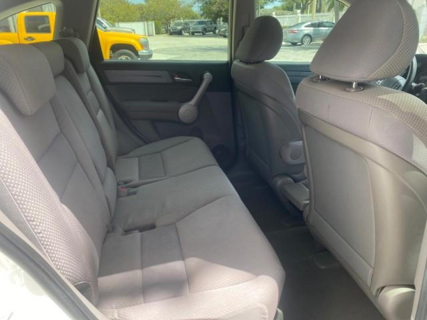 2007 Taffeta White /Gray Honda CR-V LX FL LOW MILES 49,810 (JHLRE38347C) with an 2.4L 4-Cyl Engine engine, Automatic transmission, located at 4701 North Dixie Hwy, Pompano Beach, FL, 33064, (954) 422-2889, 26.240938, -80.123474 - OUR WEBPAGE FLORIDACARS1.COM HAS OVER 100 PHOTOS AND FREE CARFAX LINK 2007 HONDA CR-V LX VIN: JHLRE38347C018084 J H L R E 3 8 3 4 7 C 0 1 8 0 8 4 4 DOOR WAGON/SPORT UTILITY 2.4L I4 F DOHC 16V 30 MPG GASOLINE FRONT WHEEL DRIVE Top Features Cloth Seats Basic Features ABS Brakes Auxiliary Audio Input P - Photo#89