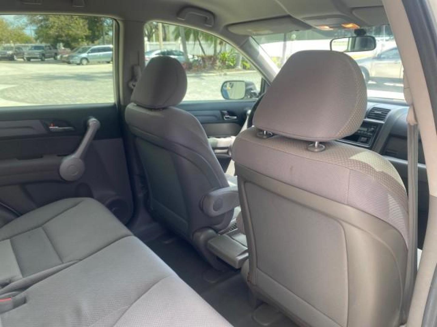 2007 Taffeta White /Gray Honda CR-V LX FL LOW MILES 49,810 (JHLRE38347C) with an 2.4L 4-Cyl Engine engine, Automatic transmission, located at 4701 North Dixie Hwy, Pompano Beach, FL, 33064, (954) 422-2889, 26.240938, -80.123474 - OUR WEBPAGE FLORIDACARS1.COM HAS OVER 100 PHOTOS AND FREE CARFAX LINK 2007 HONDA CR-V LX VIN: JHLRE38347C018084 J H L R E 3 8 3 4 7 C 0 1 8 0 8 4 4 DOOR WAGON/SPORT UTILITY 2.4L I4 F DOHC 16V 30 MPG GASOLINE FRONT WHEEL DRIVE Top Features Cloth Seats Basic Features ABS Brakes Auxiliary Audio Input P - Photo#90