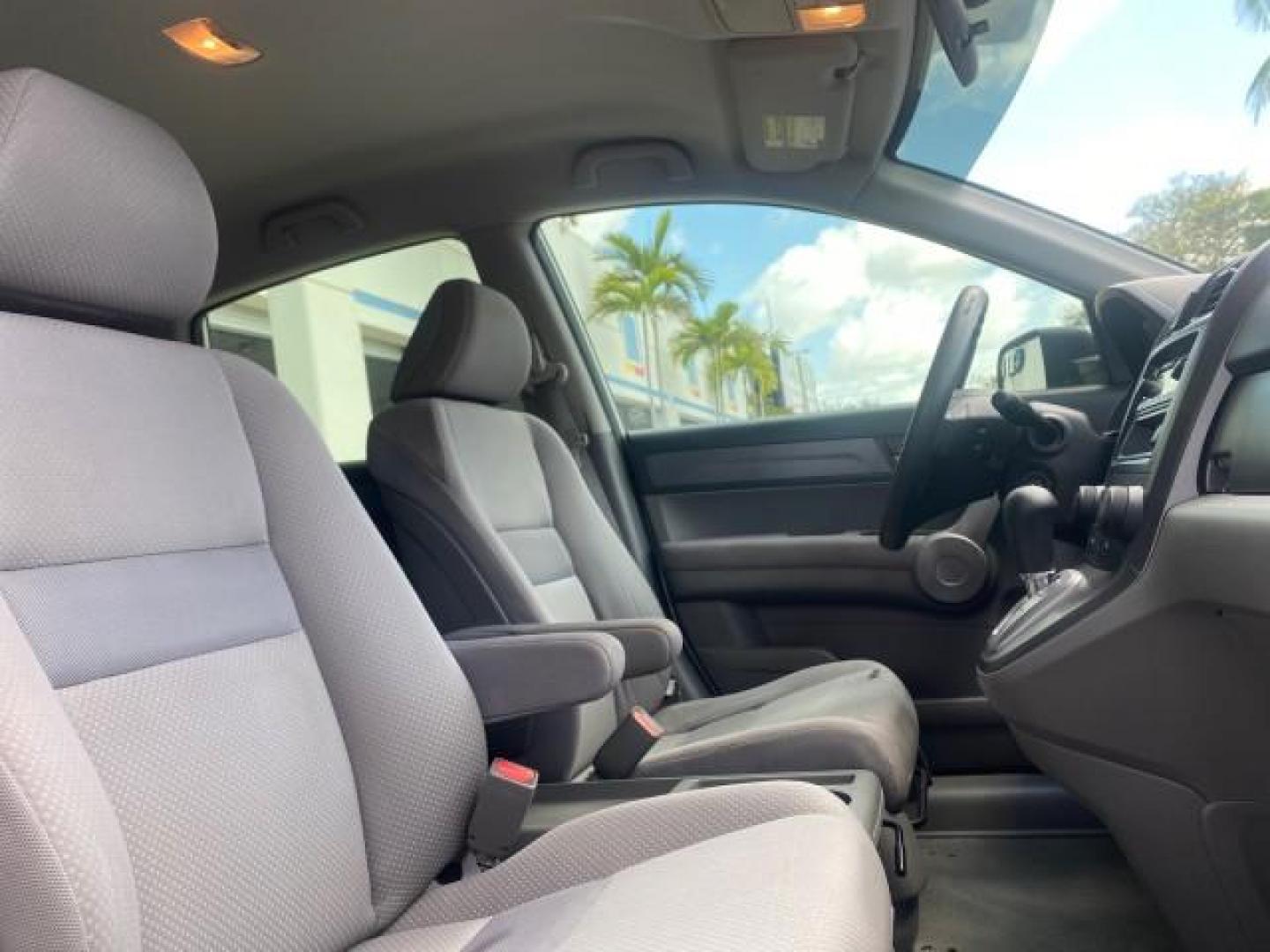 2007 Taffeta White /Gray Honda CR-V LX FL LOW MILES 49,810 (JHLRE38347C) with an 2.4L 4-Cyl Engine engine, Automatic transmission, located at 4701 North Dixie Hwy, Pompano Beach, FL, 33064, (954) 422-2889, 26.240938, -80.123474 - OUR WEBPAGE FLORIDACARS1.COM HAS OVER 100 PHOTOS AND FREE CARFAX LINK 2007 HONDA CR-V LX VIN: JHLRE38347C018084 J H L R E 3 8 3 4 7 C 0 1 8 0 8 4 4 DOOR WAGON/SPORT UTILITY 2.4L I4 F DOHC 16V 30 MPG GASOLINE FRONT WHEEL DRIVE Top Features Cloth Seats Basic Features ABS Brakes Auxiliary Audio Input P - Photo#97
