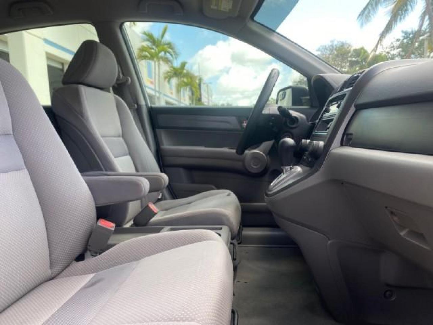 2007 Taffeta White /Gray Honda CR-V LX FL LOW MILES 49,810 (JHLRE38347C) with an 2.4L 4-Cyl Engine engine, Automatic transmission, located at 4701 North Dixie Hwy, Pompano Beach, FL, 33064, (954) 422-2889, 26.240938, -80.123474 - OUR WEBPAGE FLORIDACARS1.COM HAS OVER 100 PHOTOS AND FREE CARFAX LINK 2007 HONDA CR-V LX VIN: JHLRE38347C018084 J H L R E 3 8 3 4 7 C 0 1 8 0 8 4 4 DOOR WAGON/SPORT UTILITY 2.4L I4 F DOHC 16V 30 MPG GASOLINE FRONT WHEEL DRIVE Top Features Cloth Seats Basic Features ABS Brakes Auxiliary Audio Input P - Photo#98