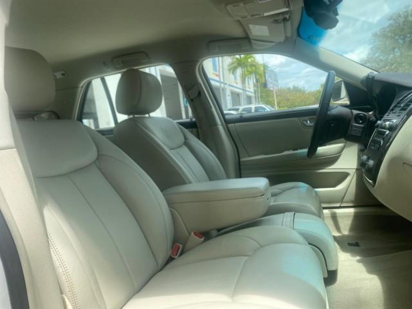 2008 White Diamond Tricoat /Light Linen Cadillac DTS 1 OWNER LOW MILES 30,516 (1G6KD57YX8U) with an Northstar 4.6L DOHC V8 Engine engine, Automatic transmission, located at 4701 North Dixie Hwy, Pompano Beach, FL, 33064, (954) 422-2889, 26.240938, -80.123474 - OUR WEBPAGE FLORIDACARS1.COM HAS OVER 100 PHOTOS AND FREE CARFAX LINK 2008 CADILLAC DTS 1SB VIN: 1G6KD57YX8U144247 1 G 6 K D 5 7 Y X 8 U 1 4 4 2 4 7 SEDAN 4 DR 4.6L V8 F GASOLINE FRONT WHEEL DRIVE Top Features A/C Seat(s) Leather Seats Alloy Wheels Memory Seat(s) BOSE Sound System Parking Sensors Bl - Photo#91