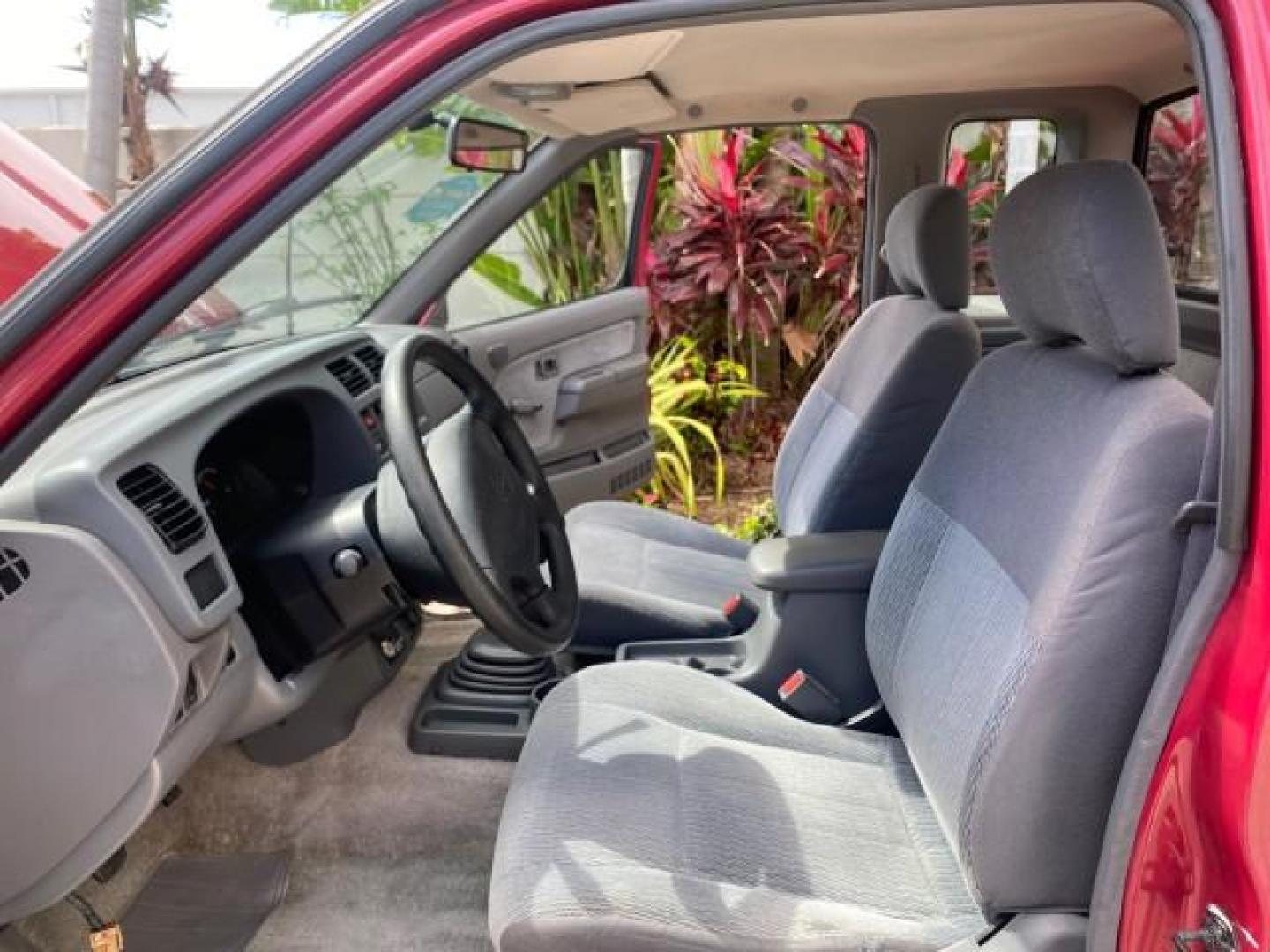 1998 Cheyenne Red (Met) /Gray Nissan Frontier 2WD XE XCAB 5 SPD LOW MILES 69,333 (1N6DD26S8WC) with an 2.4L DOHC SFI 16-Valve 4-Cyl Engine engine, Manual transmission, located at 4701 North Dixie Hwy, Pompano Beach, FL, 33064, (954) 422-2889, 26.240938, -80.123474 - OUR WEBPAGE FLORIDACARS1.COM HAS OVER 100 PHOTOS AND FREE CARFAX LINK 1998 NISSAN FRONTIER XE VIN: 1N6DD26S8WC390232 1 N 6 D D 2 6 S 8 W C 3 9 0 2 3 2 CLUB CAB PICKUP 2.4L I4 F GASOLINE REAR WHEEL DRIVE Top Features Alloy Wheels Cloth Seats Basic Features ABS Brakes AM/FM Stereo Air Conditioning Man - Photo#10