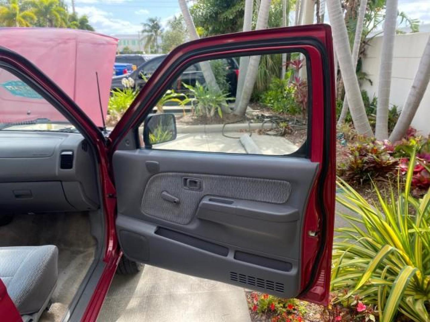 1998 Cheyenne Red (Met) /Gray Nissan Frontier 2WD XE XCAB 5 SPD LOW MILES 69,333 (1N6DD26S8WC) with an 2.4L DOHC SFI 16-Valve 4-Cyl Engine engine, Manual transmission, located at 4701 North Dixie Hwy, Pompano Beach, FL, 33064, (954) 422-2889, 26.240938, -80.123474 - OUR WEBPAGE FLORIDACARS1.COM HAS OVER 100 PHOTOS AND FREE CARFAX LINK 1998 NISSAN FRONTIER XE VIN: 1N6DD26S8WC390232 1 N 6 D D 2 6 S 8 W C 3 9 0 2 3 2 CLUB CAB PICKUP 2.4L I4 F GASOLINE REAR WHEEL DRIVE Top Features Alloy Wheels Cloth Seats Basic Features ABS Brakes AM/FM Stereo Air Conditioning Man - Photo#11