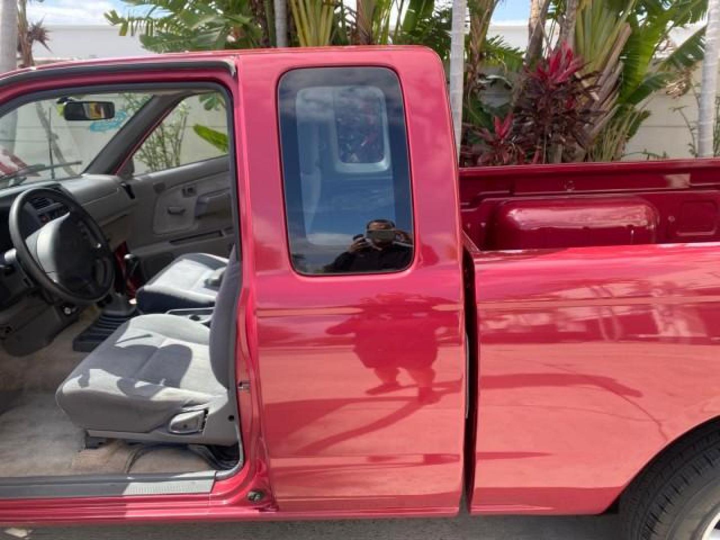 1998 Cheyenne Red (Met) /Gray Nissan Frontier 2WD XE XCAB 5 SPD LOW MILES 69,333 (1N6DD26S8WC) with an 2.4L DOHC SFI 16-Valve 4-Cyl Engine engine, Manual transmission, located at 4701 North Dixie Hwy, Pompano Beach, FL, 33064, (954) 422-2889, 26.240938, -80.123474 - OUR WEBPAGE FLORIDACARS1.COM HAS OVER 100 PHOTOS AND FREE CARFAX LINK 1998 NISSAN FRONTIER XE VIN: 1N6DD26S8WC390232 1 N 6 D D 2 6 S 8 W C 3 9 0 2 3 2 CLUB CAB PICKUP 2.4L I4 F GASOLINE REAR WHEEL DRIVE Top Features Alloy Wheels Cloth Seats Basic Features ABS Brakes AM/FM Stereo Air Conditioning Man - Photo#13