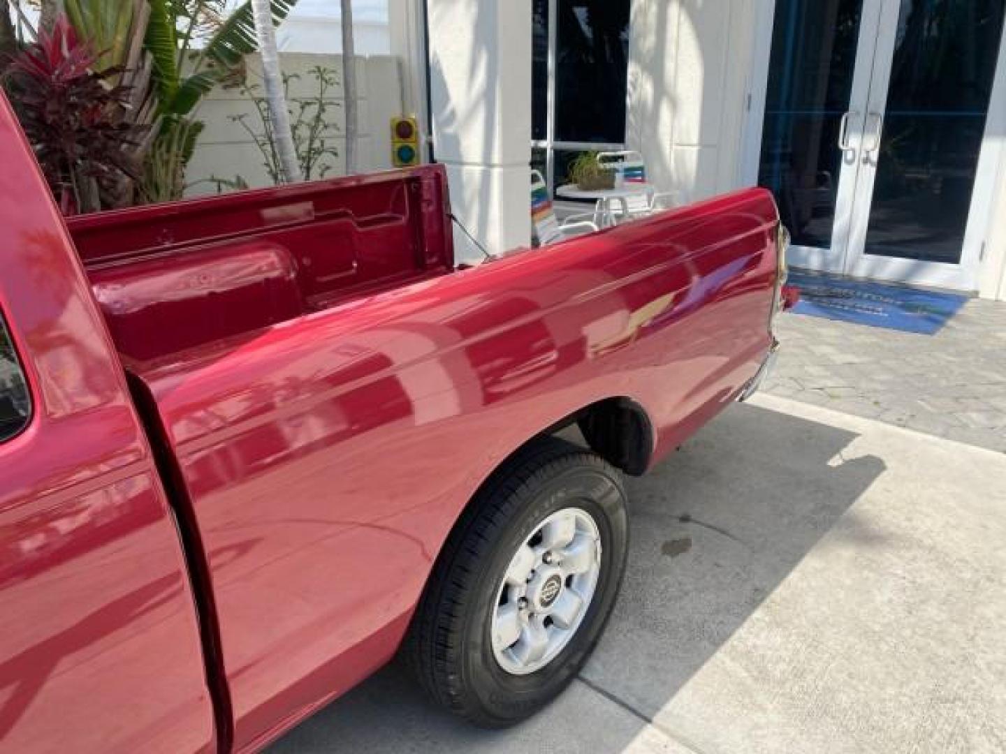 1998 Cheyenne Red (Met) /Gray Nissan Frontier 2WD XE XCAB 5 SPD LOW MILES 69,333 (1N6DD26S8WC) with an 2.4L DOHC SFI 16-Valve 4-Cyl Engine engine, Manual transmission, located at 4701 North Dixie Hwy, Pompano Beach, FL, 33064, (954) 422-2889, 26.240938, -80.123474 - OUR WEBPAGE FLORIDACARS1.COM HAS OVER 100 PHOTOS AND FREE CARFAX LINK 1998 NISSAN FRONTIER XE VIN: 1N6DD26S8WC390232 1 N 6 D D 2 6 S 8 W C 3 9 0 2 3 2 CLUB CAB PICKUP 2.4L I4 F GASOLINE REAR WHEEL DRIVE Top Features Alloy Wheels Cloth Seats Basic Features ABS Brakes AM/FM Stereo Air Conditioning Man - Photo#14