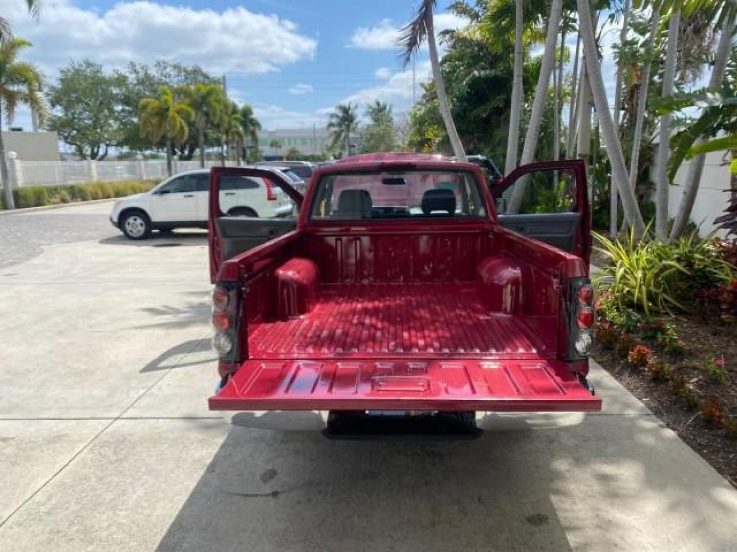 1998 Cheyenne Red (Met) /Gray Nissan Frontier 2WD XE XCAB 5 SPD LOW MILES 69,333 (1N6DD26S8WC) with an 2.4L DOHC SFI 16-Valve 4-Cyl Engine engine, Manual transmission, located at 4701 North Dixie Hwy, Pompano Beach, FL, 33064, (954) 422-2889, 26.240938, -80.123474 - OUR WEBPAGE FLORIDACARS1.COM HAS OVER 100 PHOTOS AND FREE CARFAX LINK 1998 NISSAN FRONTIER XE VIN: 1N6DD26S8WC390232 1 N 6 D D 2 6 S 8 W C 3 9 0 2 3 2 CLUB CAB PICKUP 2.4L I4 F GASOLINE REAR WHEEL DRIVE Top Features Alloy Wheels Cloth Seats Basic Features ABS Brakes AM/FM Stereo Air Conditioning Man - Photo#15