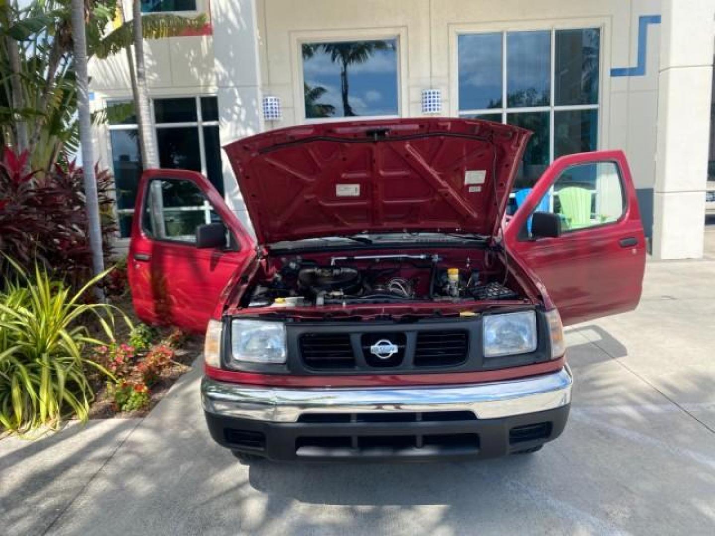 1998 Cheyenne Red (Met) /Gray Nissan Frontier 2WD XE XCAB 5 SPD LOW MILES 69,333 (1N6DD26S8WC) with an 2.4L DOHC SFI 16-Valve 4-Cyl Engine engine, Manual transmission, located at 4701 North Dixie Hwy, Pompano Beach, FL, 33064, (954) 422-2889, 26.240938, -80.123474 - OUR WEBPAGE FLORIDACARS1.COM HAS OVER 100 PHOTOS AND FREE CARFAX LINK 1998 NISSAN FRONTIER XE VIN: 1N6DD26S8WC390232 1 N 6 D D 2 6 S 8 W C 3 9 0 2 3 2 CLUB CAB PICKUP 2.4L I4 F GASOLINE REAR WHEEL DRIVE Top Features Alloy Wheels Cloth Seats Basic Features ABS Brakes AM/FM Stereo Air Conditioning Man - Photo#16