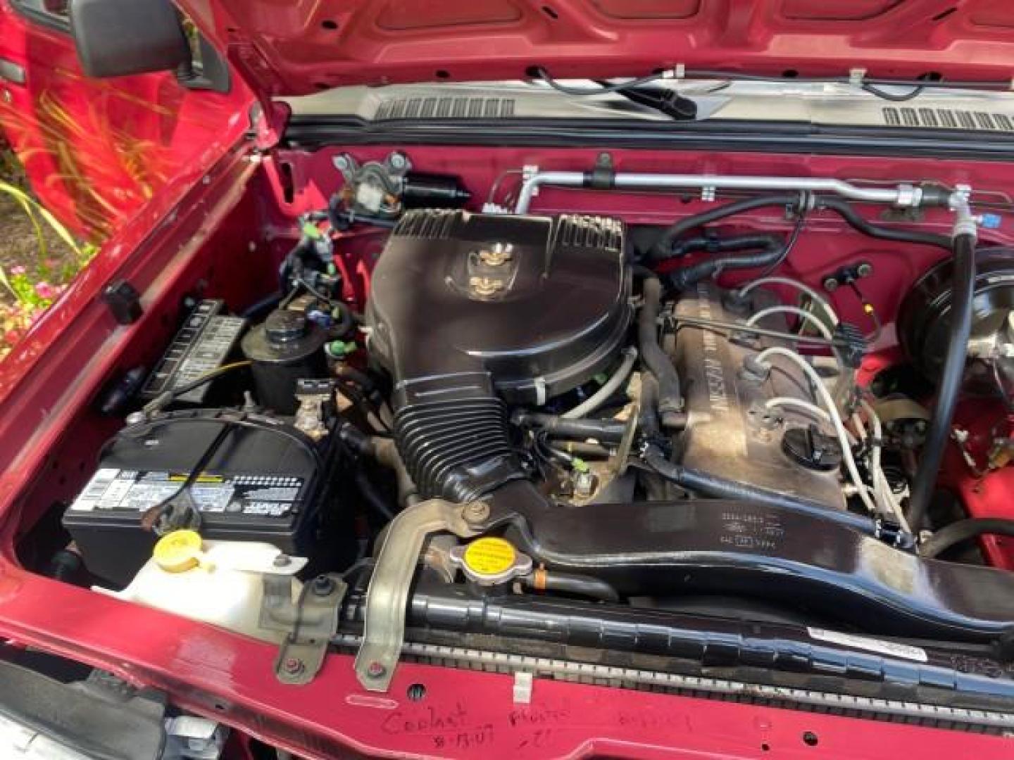 1998 Cheyenne Red (Met) /Gray Nissan Frontier 2WD XE XCAB 5 SPD LOW MILES 69,333 (1N6DD26S8WC) with an 2.4L DOHC SFI 16-Valve 4-Cyl Engine engine, Manual transmission, located at 4701 North Dixie Hwy, Pompano Beach, FL, 33064, (954) 422-2889, 26.240938, -80.123474 - OUR WEBPAGE FLORIDACARS1.COM HAS OVER 100 PHOTOS AND FREE CARFAX LINK 1998 NISSAN FRONTIER XE VIN: 1N6DD26S8WC390232 1 N 6 D D 2 6 S 8 W C 3 9 0 2 3 2 CLUB CAB PICKUP 2.4L I4 F GASOLINE REAR WHEEL DRIVE Top Features Alloy Wheels Cloth Seats Basic Features ABS Brakes AM/FM Stereo Air Conditioning Man - Photo#24