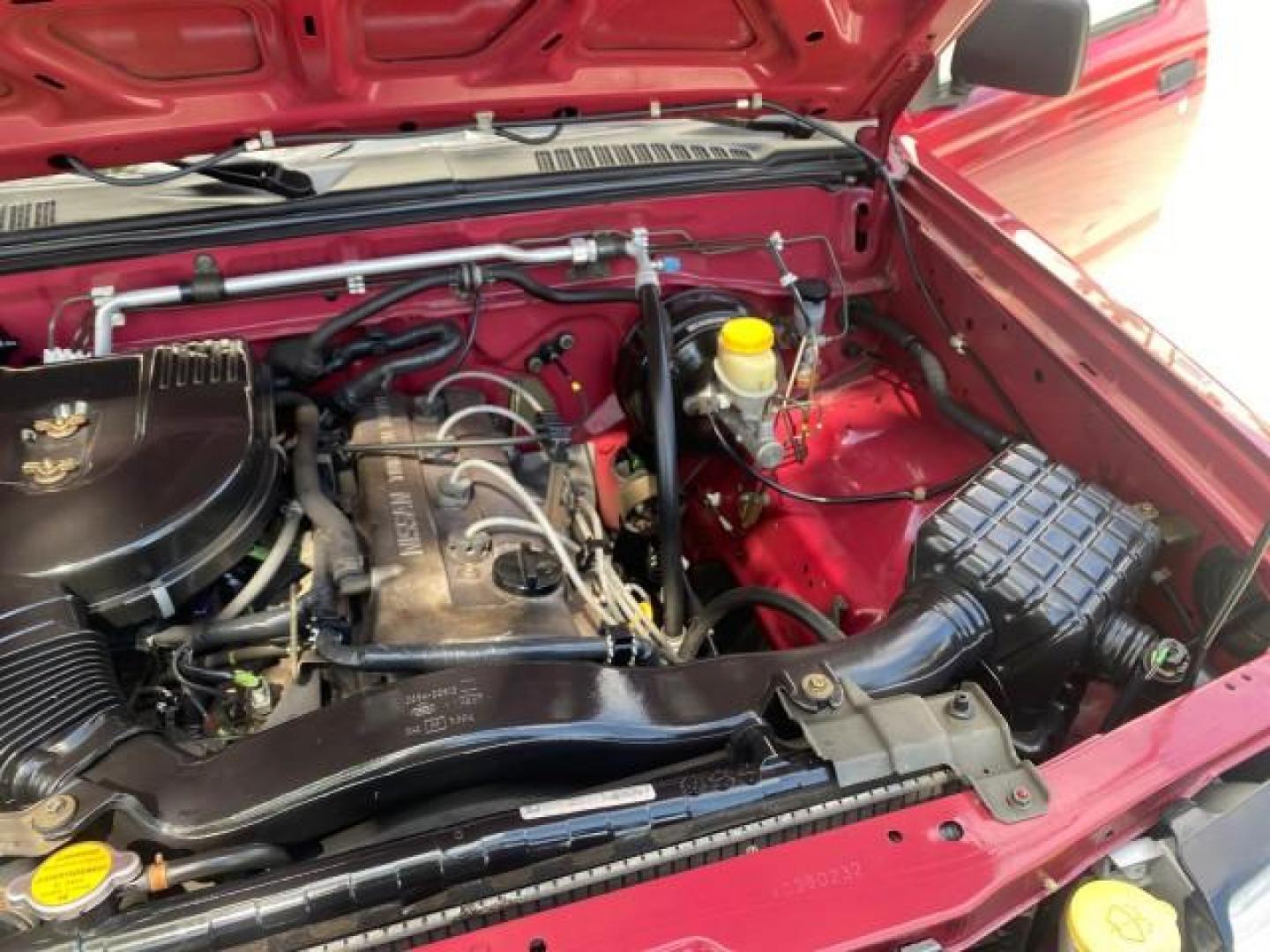 1998 Cheyenne Red (Met) /Gray Nissan Frontier 2WD XE XCAB 5 SPD LOW MILES 69,333 (1N6DD26S8WC) with an 2.4L DOHC SFI 16-Valve 4-Cyl Engine engine, Manual transmission, located at 4701 North Dixie Hwy, Pompano Beach, FL, 33064, (954) 422-2889, 26.240938, -80.123474 - OUR WEBPAGE FLORIDACARS1.COM HAS OVER 100 PHOTOS AND FREE CARFAX LINK 1998 NISSAN FRONTIER XE VIN: 1N6DD26S8WC390232 1 N 6 D D 2 6 S 8 W C 3 9 0 2 3 2 CLUB CAB PICKUP 2.4L I4 F GASOLINE REAR WHEEL DRIVE Top Features Alloy Wheels Cloth Seats Basic Features ABS Brakes AM/FM Stereo Air Conditioning Man - Photo#25