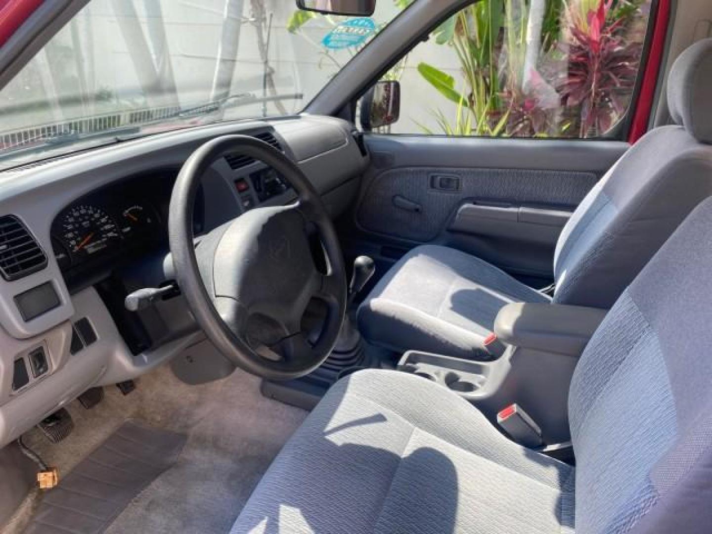 1998 Cheyenne Red (Met) /Gray Nissan Frontier 2WD XE XCAB 5 SPD LOW MILES 69,333 (1N6DD26S8WC) with an 2.4L DOHC SFI 16-Valve 4-Cyl Engine engine, Manual transmission, located at 4701 North Dixie Hwy, Pompano Beach, FL, 33064, (954) 422-2889, 26.240938, -80.123474 - OUR WEBPAGE FLORIDACARS1.COM HAS OVER 100 PHOTOS AND FREE CARFAX LINK 1998 NISSAN FRONTIER XE VIN: 1N6DD26S8WC390232 1 N 6 D D 2 6 S 8 W C 3 9 0 2 3 2 CLUB CAB PICKUP 2.4L I4 F GASOLINE REAR WHEEL DRIVE Top Features Alloy Wheels Cloth Seats Basic Features ABS Brakes AM/FM Stereo Air Conditioning Man - Photo#32