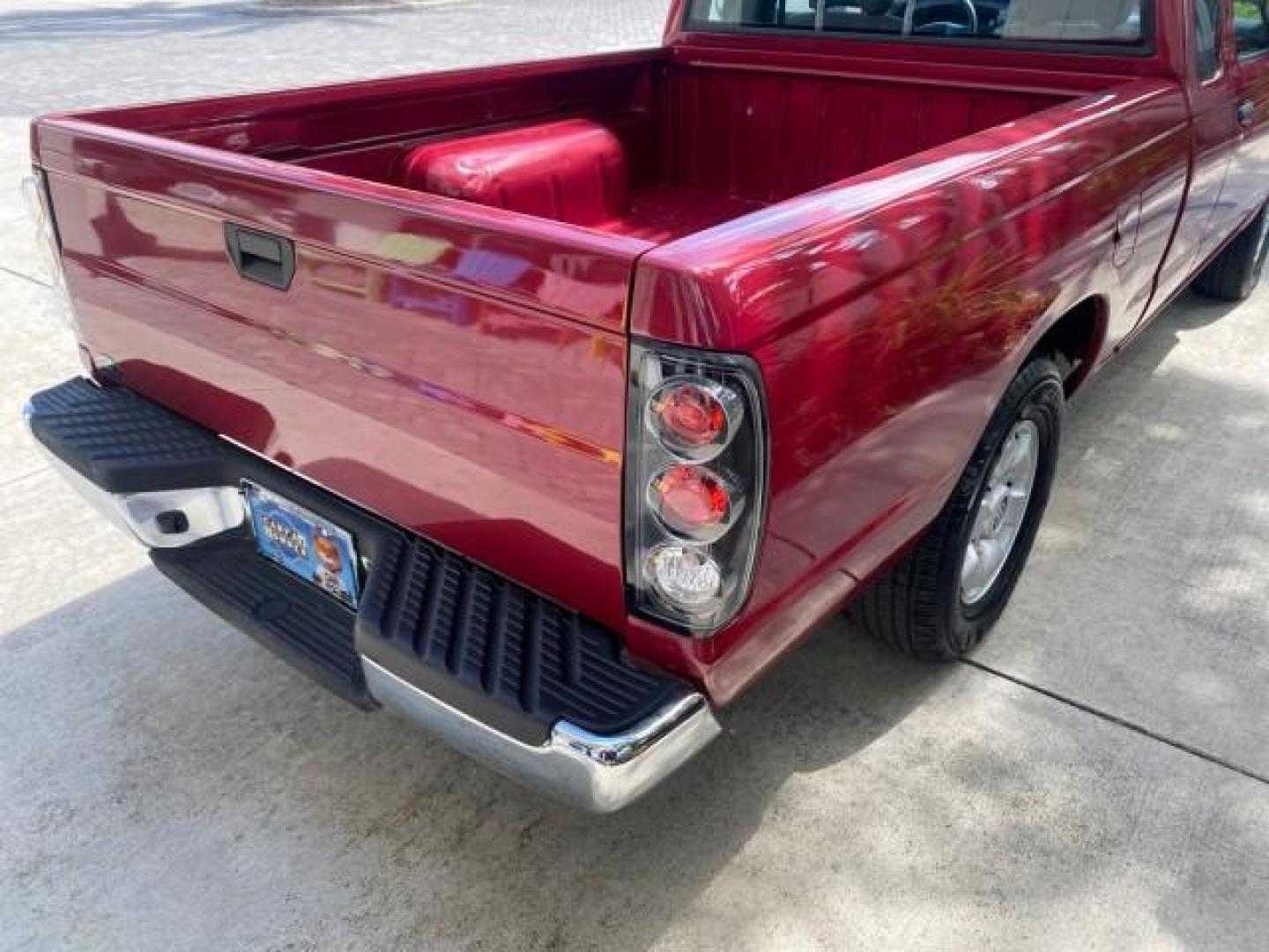 1998 Cheyenne Red (Met) /Gray Nissan Frontier 2WD XE XCAB 5 SPD LOW MILES 69,333 (1N6DD26S8WC) with an 2.4L DOHC SFI 16-Valve 4-Cyl Engine engine, Manual transmission, located at 4701 North Dixie Hwy, Pompano Beach, FL, 33064, (954) 422-2889, 26.240938, -80.123474 - OUR WEBPAGE FLORIDACARS1.COM HAS OVER 100 PHOTOS AND FREE CARFAX LINK 1998 NISSAN FRONTIER XE VIN: 1N6DD26S8WC390232 1 N 6 D D 2 6 S 8 W C 3 9 0 2 3 2 CLUB CAB PICKUP 2.4L I4 F GASOLINE REAR WHEEL DRIVE Top Features Alloy Wheels Cloth Seats Basic Features ABS Brakes AM/FM Stereo Air Conditioning Man - Photo#68