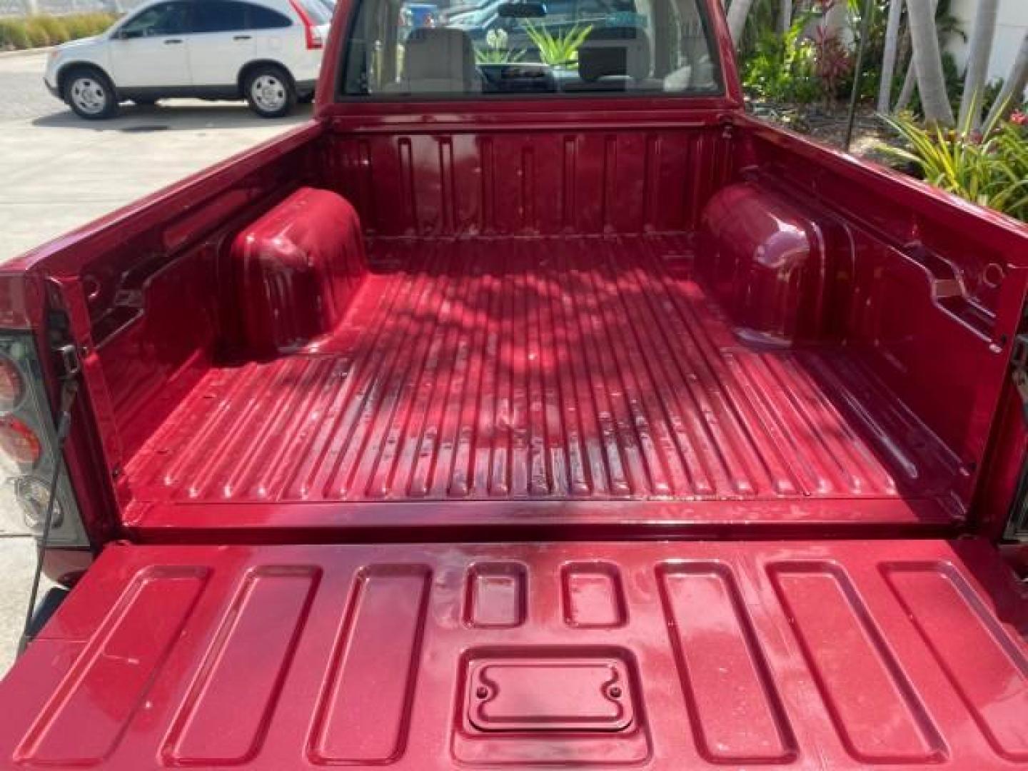 1998 Cheyenne Red (Met) /Gray Nissan Frontier 2WD XE XCAB 5 SPD LOW MILES 69,333 (1N6DD26S8WC) with an 2.4L DOHC SFI 16-Valve 4-Cyl Engine engine, Manual transmission, located at 4701 North Dixie Hwy, Pompano Beach, FL, 33064, (954) 422-2889, 26.240938, -80.123474 - OUR WEBPAGE FLORIDACARS1.COM HAS OVER 100 PHOTOS AND FREE CARFAX LINK 1998 NISSAN FRONTIER XE VIN: 1N6DD26S8WC390232 1 N 6 D D 2 6 S 8 W C 3 9 0 2 3 2 CLUB CAB PICKUP 2.4L I4 F GASOLINE REAR WHEEL DRIVE Top Features Alloy Wheels Cloth Seats Basic Features ABS Brakes AM/FM Stereo Air Conditioning Man - Photo#70