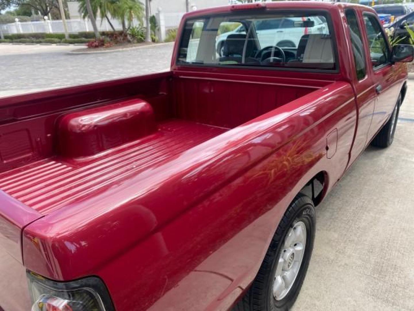 1998 Cheyenne Red (Met) /Gray Nissan Frontier 2WD XE XCAB 5 SPD LOW MILES 69,333 (1N6DD26S8WC) with an 2.4L DOHC SFI 16-Valve 4-Cyl Engine engine, Manual transmission, located at 4701 North Dixie Hwy, Pompano Beach, FL, 33064, (954) 422-2889, 26.240938, -80.123474 - OUR WEBPAGE FLORIDACARS1.COM HAS OVER 100 PHOTOS AND FREE CARFAX LINK 1998 NISSAN FRONTIER XE VIN: 1N6DD26S8WC390232 1 N 6 D D 2 6 S 8 W C 3 9 0 2 3 2 CLUB CAB PICKUP 2.4L I4 F GASOLINE REAR WHEEL DRIVE Top Features Alloy Wheels Cloth Seats Basic Features ABS Brakes AM/FM Stereo Air Conditioning Man - Photo#78