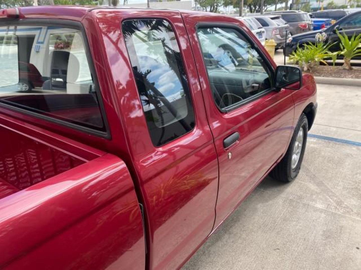 1998 Cheyenne Red (Met) /Gray Nissan Frontier 2WD XE XCAB 5 SPD LOW MILES 69,333 (1N6DD26S8WC) with an 2.4L DOHC SFI 16-Valve 4-Cyl Engine engine, Manual transmission, located at 4701 North Dixie Hwy, Pompano Beach, FL, 33064, (954) 422-2889, 26.240938, -80.123474 - OUR WEBPAGE FLORIDACARS1.COM HAS OVER 100 PHOTOS AND FREE CARFAX LINK 1998 NISSAN FRONTIER XE VIN: 1N6DD26S8WC390232 1 N 6 D D 2 6 S 8 W C 3 9 0 2 3 2 CLUB CAB PICKUP 2.4L I4 F GASOLINE REAR WHEEL DRIVE Top Features Alloy Wheels Cloth Seats Basic Features ABS Brakes AM/FM Stereo Air Conditioning Man - Photo#84