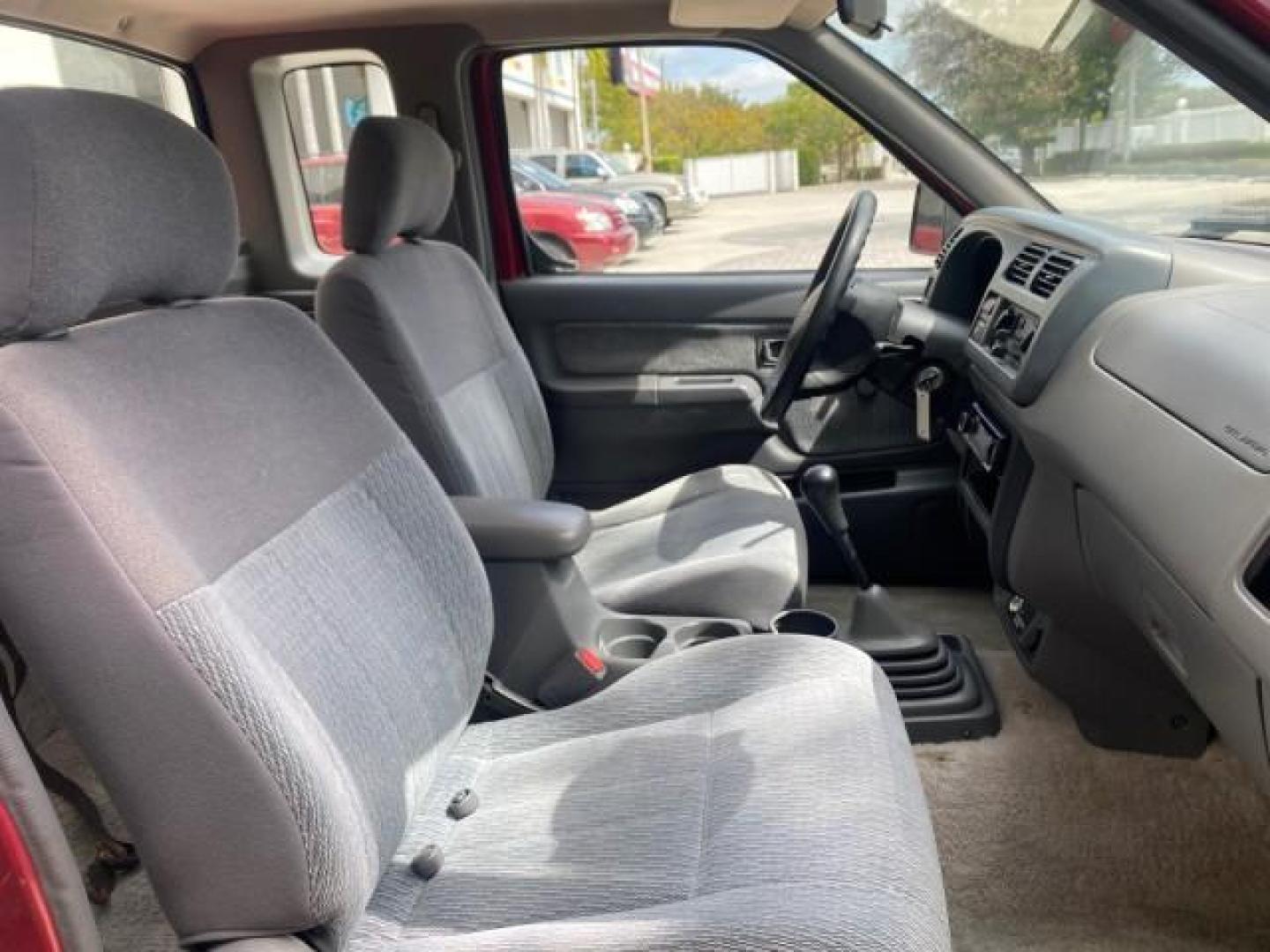1998 Cheyenne Red (Met) /Gray Nissan Frontier 2WD XE XCAB 5 SPD LOW MILES 69,333 (1N6DD26S8WC) with an 2.4L DOHC SFI 16-Valve 4-Cyl Engine engine, Manual transmission, located at 4701 North Dixie Hwy, Pompano Beach, FL, 33064, (954) 422-2889, 26.240938, -80.123474 - OUR WEBPAGE FLORIDACARS1.COM HAS OVER 100 PHOTOS AND FREE CARFAX LINK 1998 NISSAN FRONTIER XE VIN: 1N6DD26S8WC390232 1 N 6 D D 2 6 S 8 W C 3 9 0 2 3 2 CLUB CAB PICKUP 2.4L I4 F GASOLINE REAR WHEEL DRIVE Top Features Alloy Wheels Cloth Seats Basic Features ABS Brakes AM/FM Stereo Air Conditioning Man - Photo#91