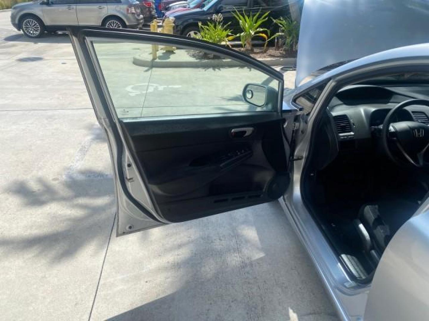 2009 Alabaster Silver Metallic /Black Honda Civic Sdn 1 OWNER FL LOW MILES 36,489 LX-S (2HGFA16609H) with an 1.8L SOHC MPFI 16-Valve i-VTEC I4 Engine engine, Automatic transmission, located at 4701 North Dixie Hwy, Pompano Beach, FL, 33064, (954) 422-2889, 26.240938, -80.123474 - OUR WEBPAGE FLORIDACARS1.COM HAS OVER 100 PHOTOS AND FREE CARFAX LINK 2009 HONDA CIVIC LX-S 36 MPG VIN: 2HGFA16609H342129 2 H G F A 1 6 6 0 9 H 3 4 2 1 2 9 SEDAN 4 DR 1.8L I4 F SOHC 16V GASOLINE FRONT WHEEL DRIVE Top Features Alloy Wheels Cloth Seats Basic Features ABS Brakes Auxiliary Audio Input P - Photo#9