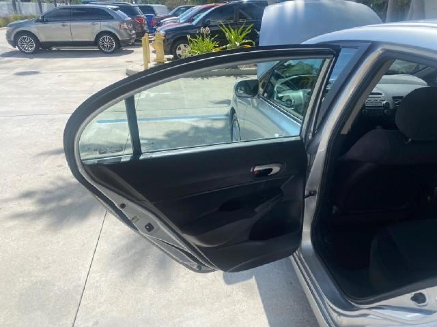 2009 Alabaster Silver Metallic /Black Honda Civic Sdn 1 OWNER FL LOW MILES 36,489 LX-S (2HGFA16609H) with an 1.8L SOHC MPFI 16-Valve i-VTEC I4 Engine engine, Automatic transmission, located at 4701 North Dixie Hwy, Pompano Beach, FL, 33064, (954) 422-2889, 26.240938, -80.123474 - OUR WEBPAGE FLORIDACARS1.COM HAS OVER 100 PHOTOS AND FREE CARFAX LINK 2009 HONDA CIVIC LX-S 36 MPG VIN: 2HGFA16609H342129 2 H G F A 1 6 6 0 9 H 3 4 2 1 2 9 SEDAN 4 DR 1.8L I4 F SOHC 16V GASOLINE FRONT WHEEL DRIVE Top Features Alloy Wheels Cloth Seats Basic Features ABS Brakes Auxiliary Audio Input P - Photo#13
