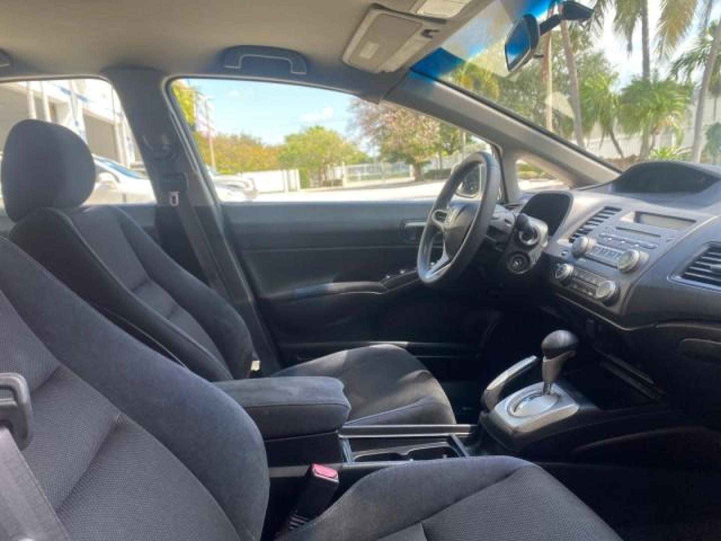2009 Alabaster Silver Metallic /Black Honda Civic Sdn 1 OWNER FL LOW MILES 36,489 LX-S (2HGFA16609H) with an 1.8L SOHC MPFI 16-Valve i-VTEC I4 Engine engine, Automatic transmission, located at 4701 North Dixie Hwy, Pompano Beach, FL, 33064, (954) 422-2889, 26.240938, -80.123474 - OUR WEBPAGE FLORIDACARS1.COM HAS OVER 100 PHOTOS AND FREE CARFAX LINK 2009 HONDA CIVIC LX-S 36 MPG VIN: 2HGFA16609H342129 2 H G F A 1 6 6 0 9 H 3 4 2 1 2 9 SEDAN 4 DR 1.8L I4 F SOHC 16V GASOLINE FRONT WHEEL DRIVE Top Features Alloy Wheels Cloth Seats Basic Features ABS Brakes Auxiliary Audio Input P - Photo#89