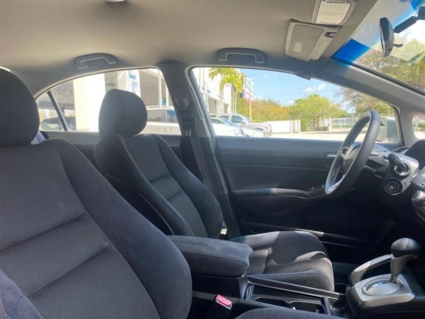 2009 Alabaster Silver Metallic /Black Honda Civic Sdn 1 OWNER FL LOW MILES 36,489 LX-S (2HGFA16609H) with an 1.8L SOHC MPFI 16-Valve i-VTEC I4 Engine engine, Automatic transmission, located at 4701 North Dixie Hwy, Pompano Beach, FL, 33064, (954) 422-2889, 26.240938, -80.123474 - OUR WEBPAGE FLORIDACARS1.COM HAS OVER 100 PHOTOS AND FREE CARFAX LINK 2009 HONDA CIVIC LX-S 36 MPG VIN: 2HGFA16609H342129 2 H G F A 1 6 6 0 9 H 3 4 2 1 2 9 SEDAN 4 DR 1.8L I4 F SOHC 16V GASOLINE FRONT WHEEL DRIVE Top Features Alloy Wheels Cloth Seats Basic Features ABS Brakes Auxiliary Audio Input P - Photo#90